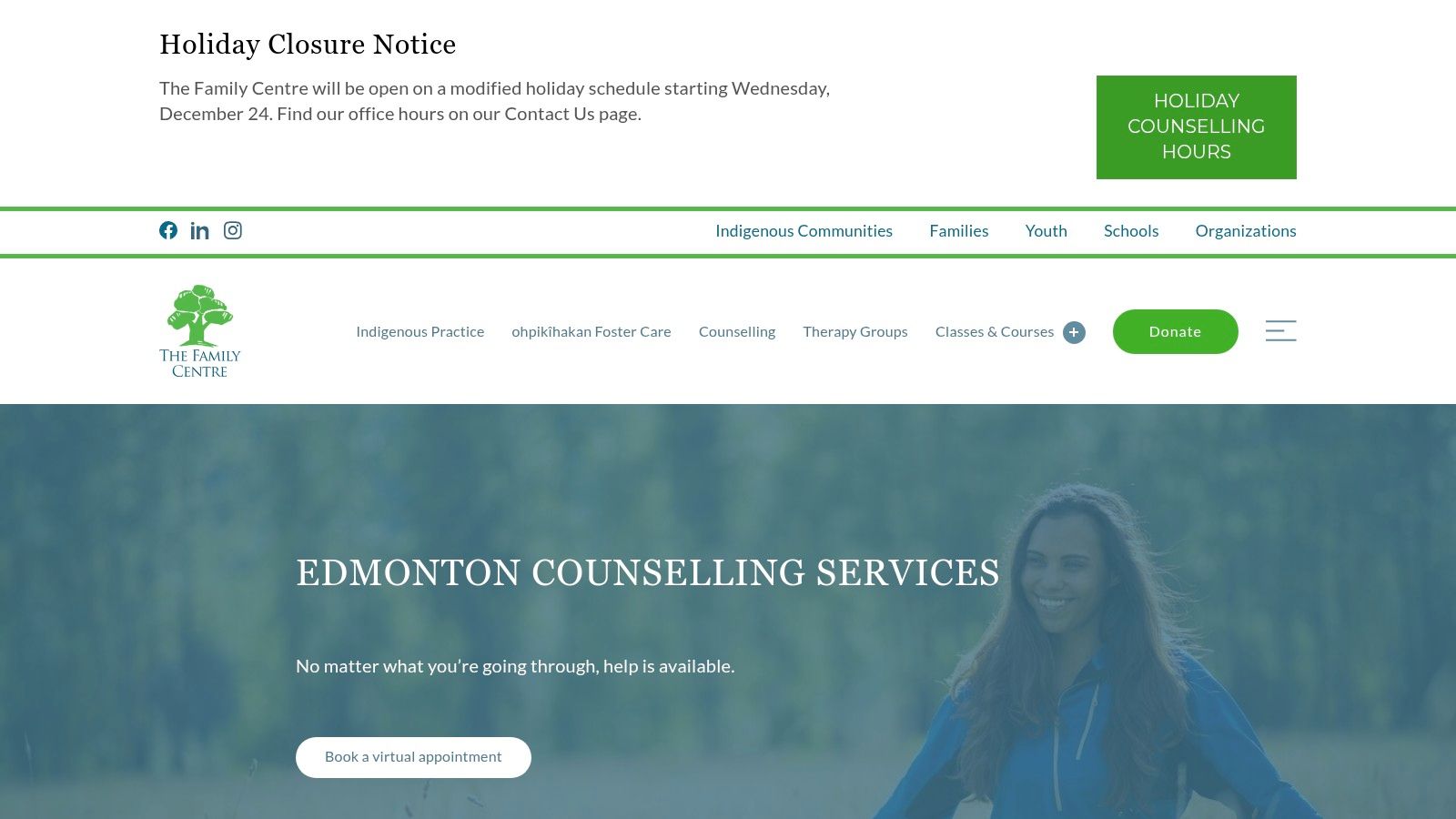 The Family Centre's website on a laptop, showing counselling services.