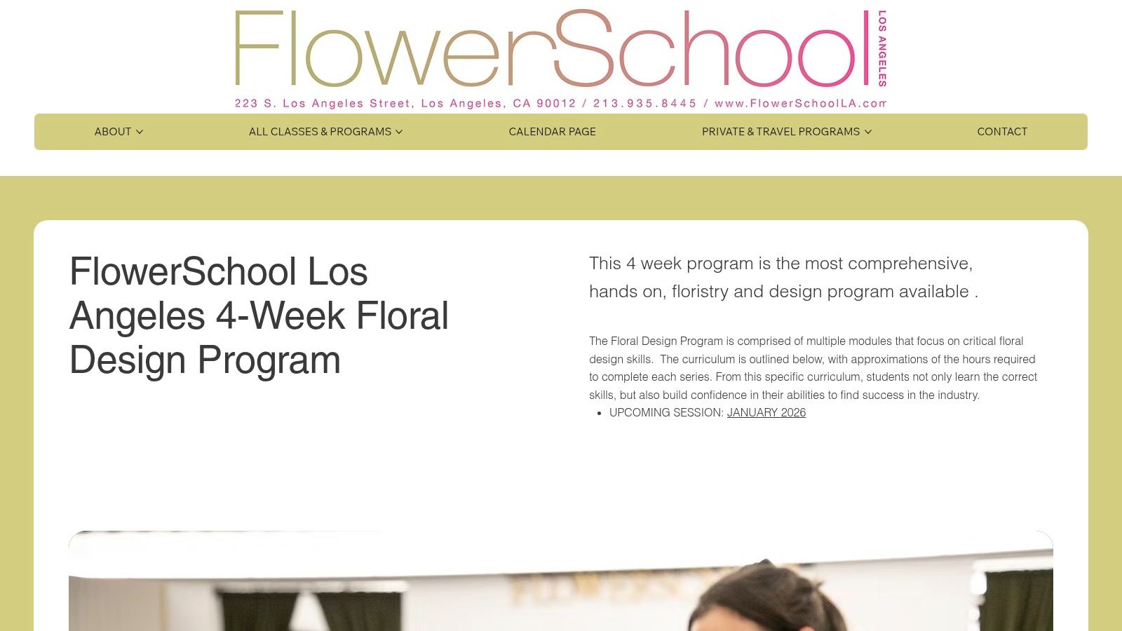 A classroom at FlowerSchool Los Angeles with students creating elaborate floral arrangements