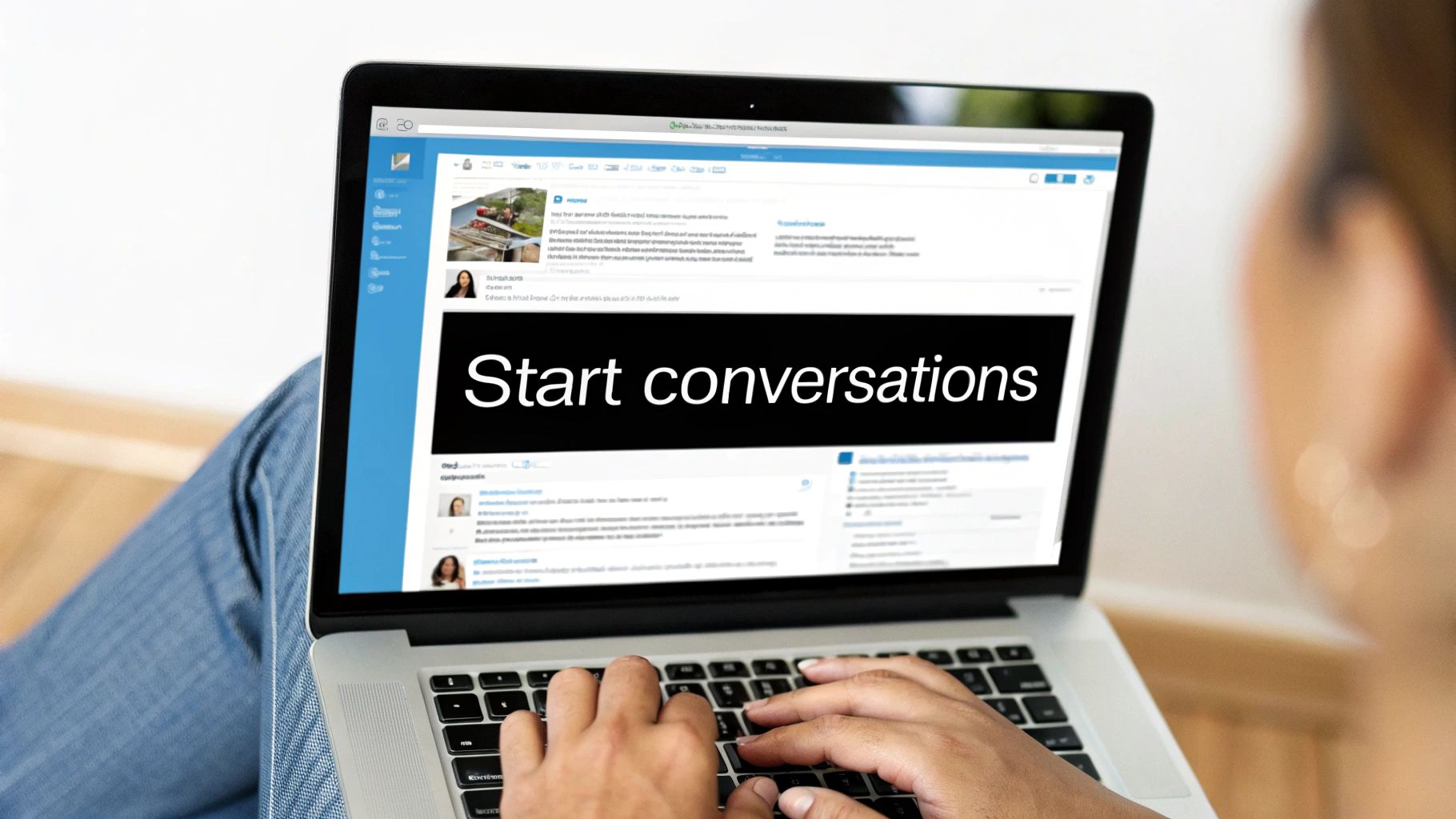 A person types on a laptop, its screen prominently displaying the text 'Start conversations' on a dark background.