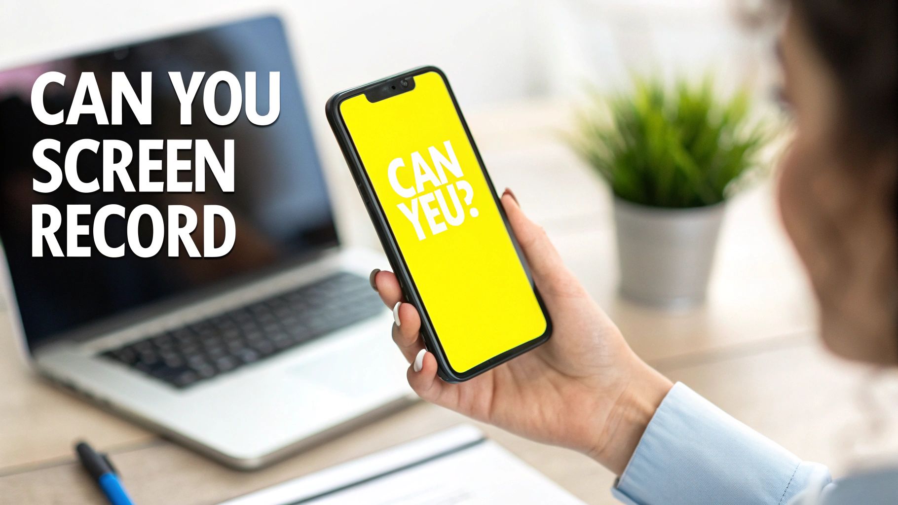 A person holds a smartphone with 'CAN YEU?' on its screen, while a laptop displays 'CAN YOU SCREEN RECORD'.