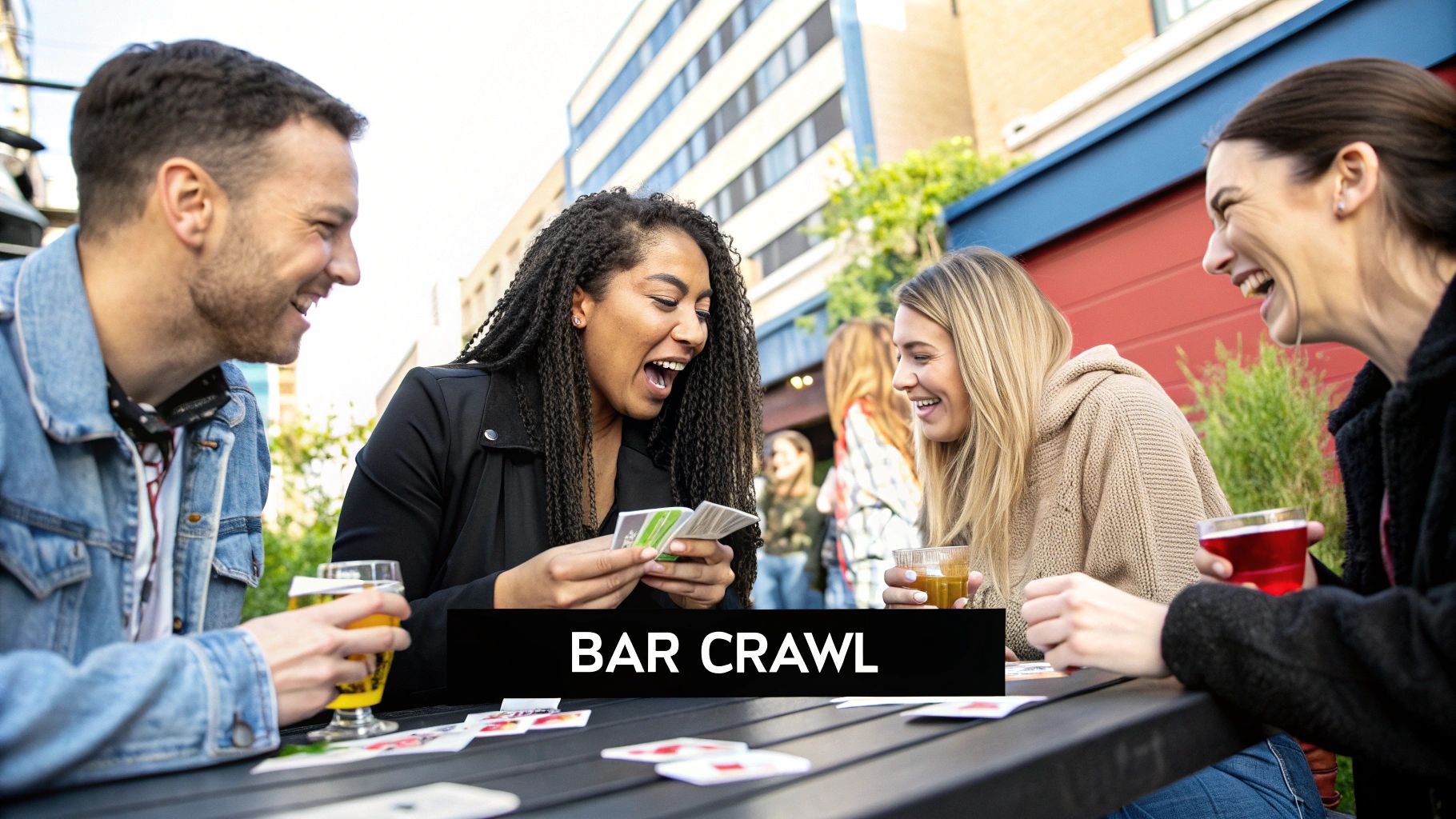A group of friends laughing and looking at a scavenger hunt list in a lively bar setting.