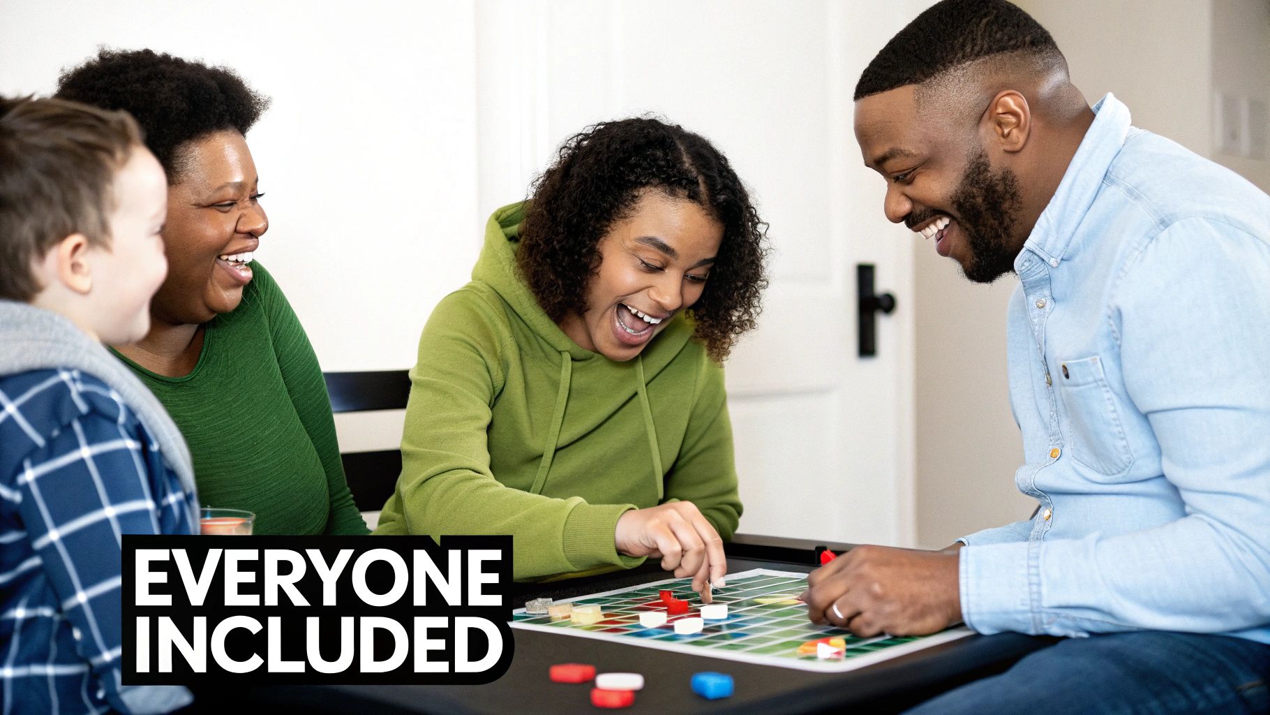 A diverse family laughing and enjoying a board game together at home.