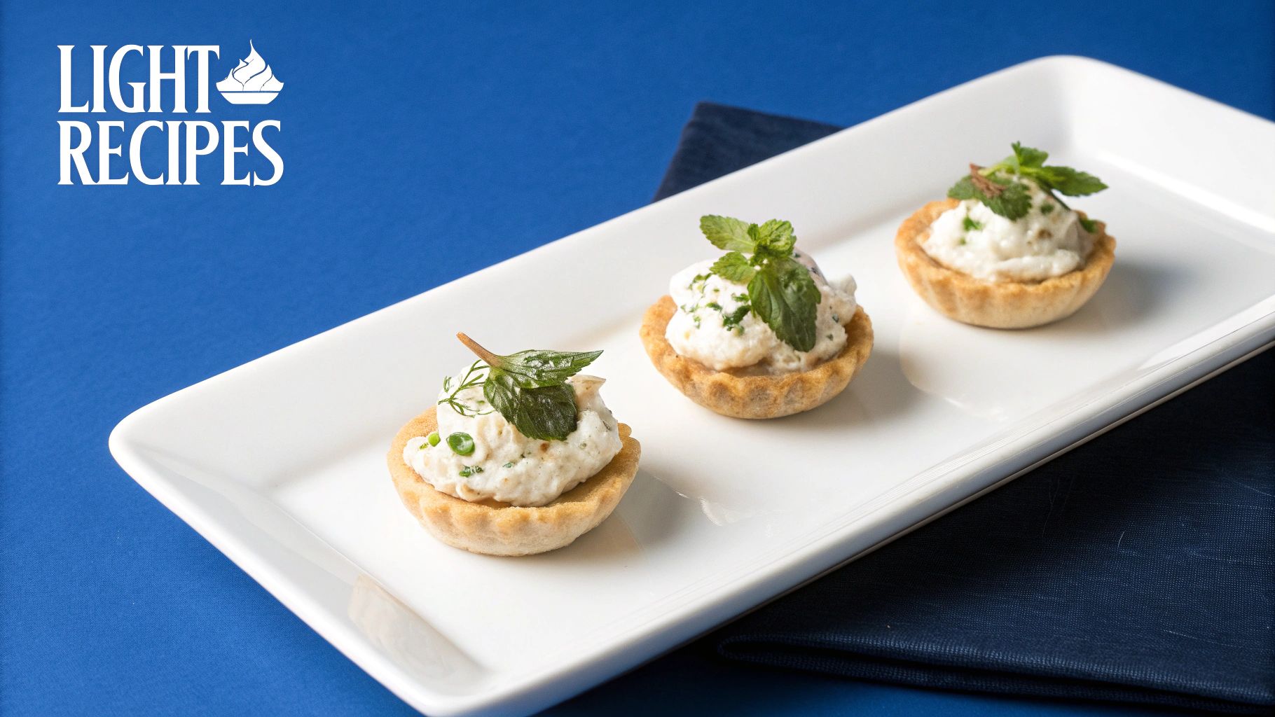 A healthy meal with cream cheese on rye crackers with vegetables