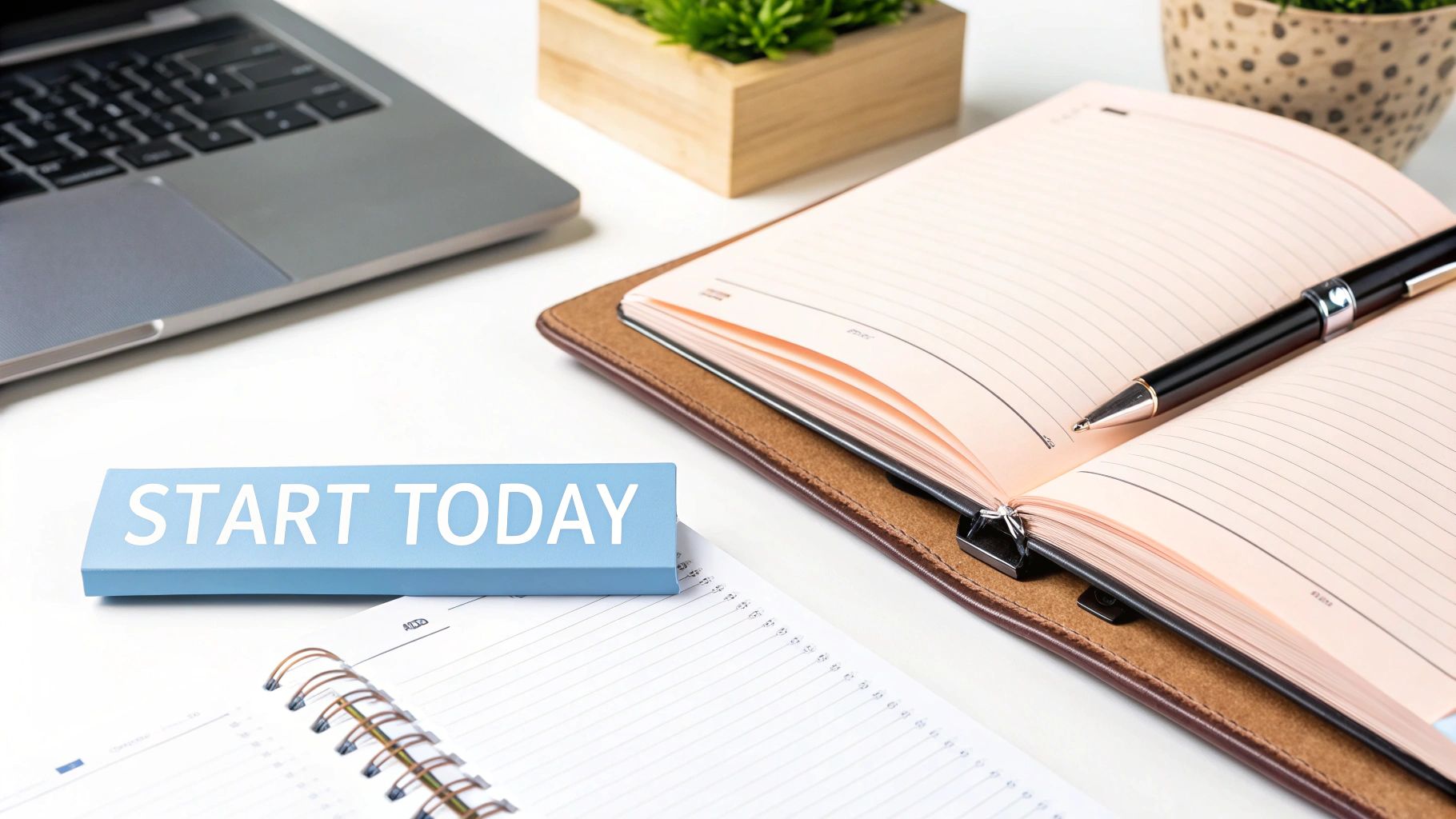 A person writing in a journal with a cup of coffee nearby, symbolizing focus and productivity.