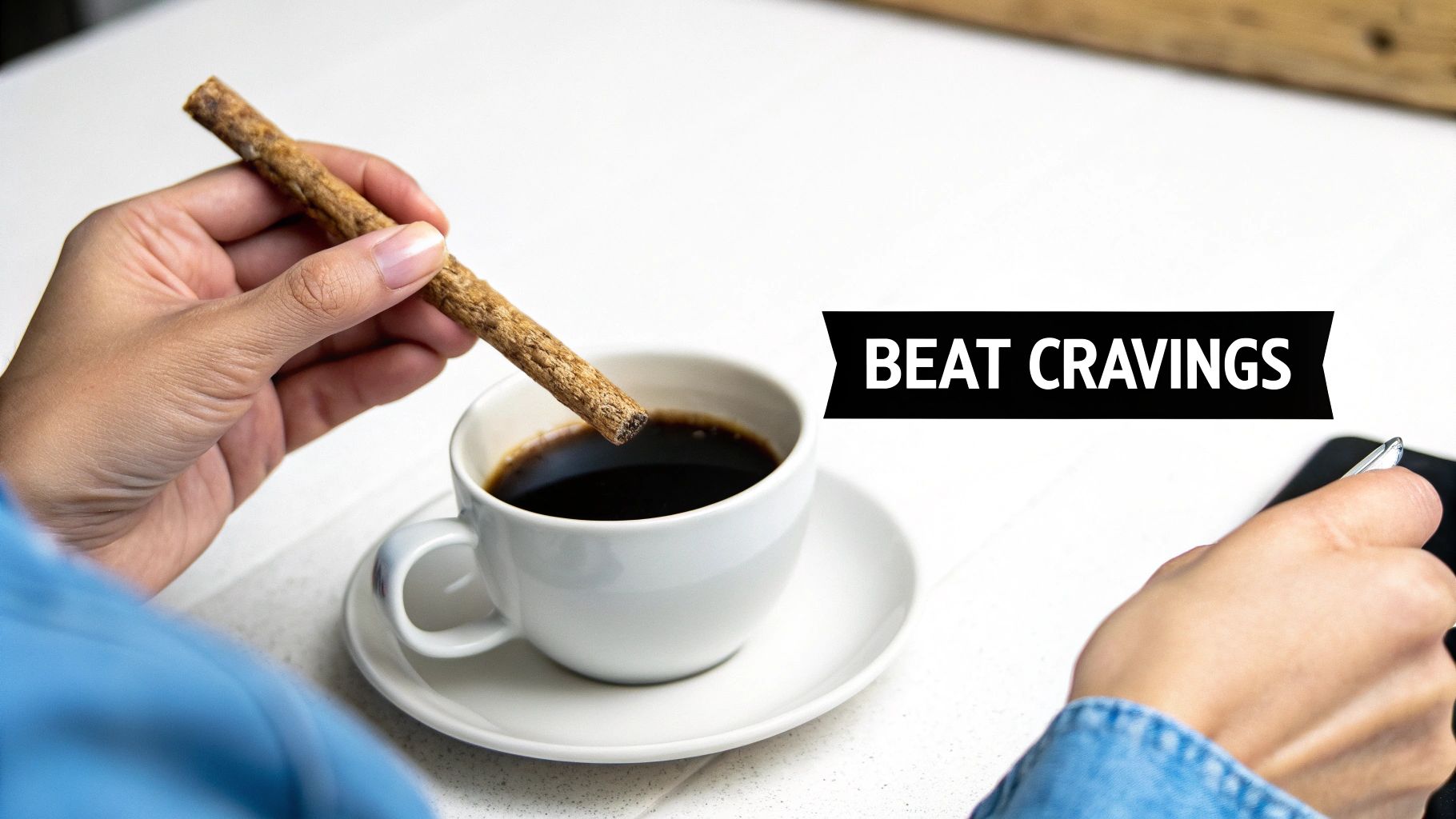 Close-up of a hand holding a licorice stick above black coffee with a 'BEAT CRAVINGS' banner.