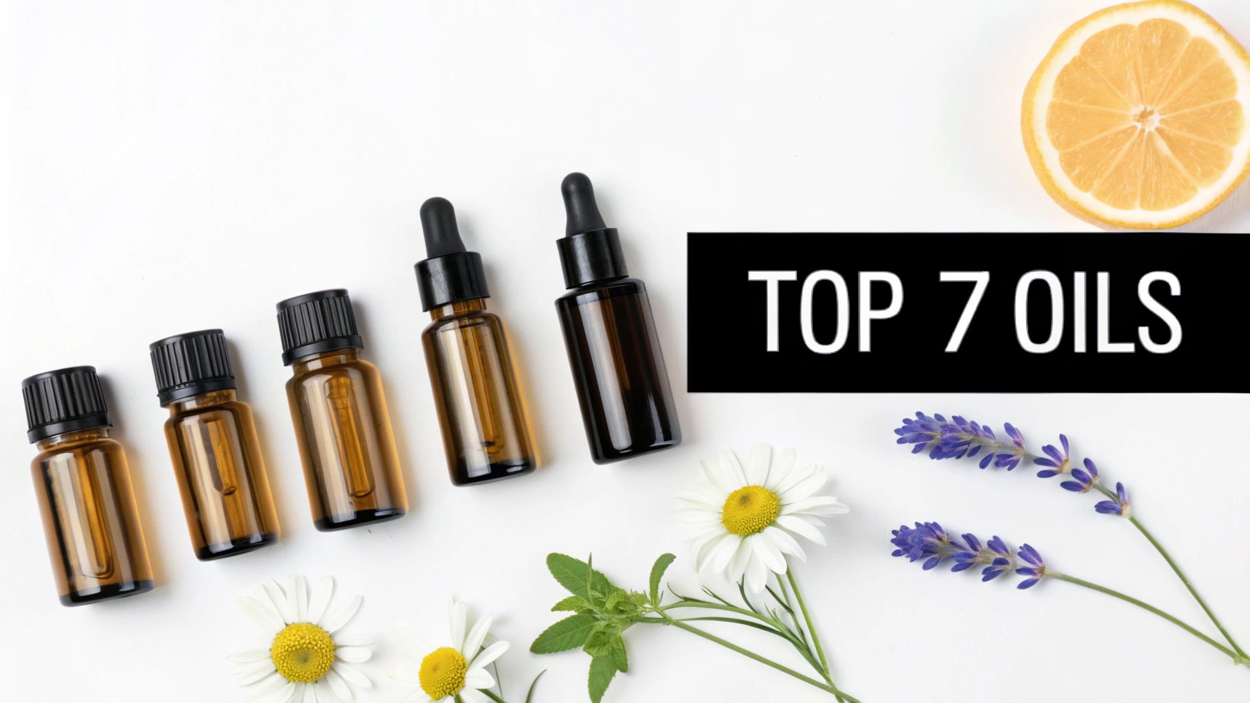 A collection of essential oil bottles arranged neatly on a wooden surface