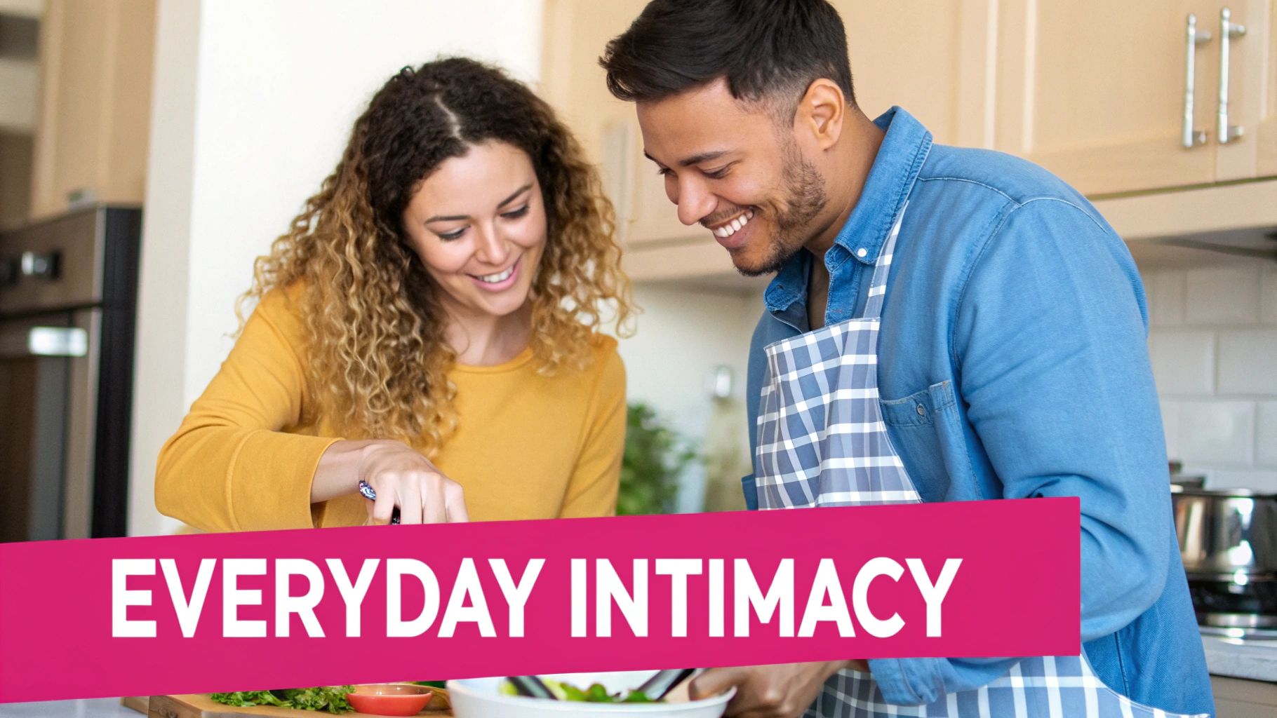 A happy couple smiling and cooking together in a kitchen, showing everyday intimacy.