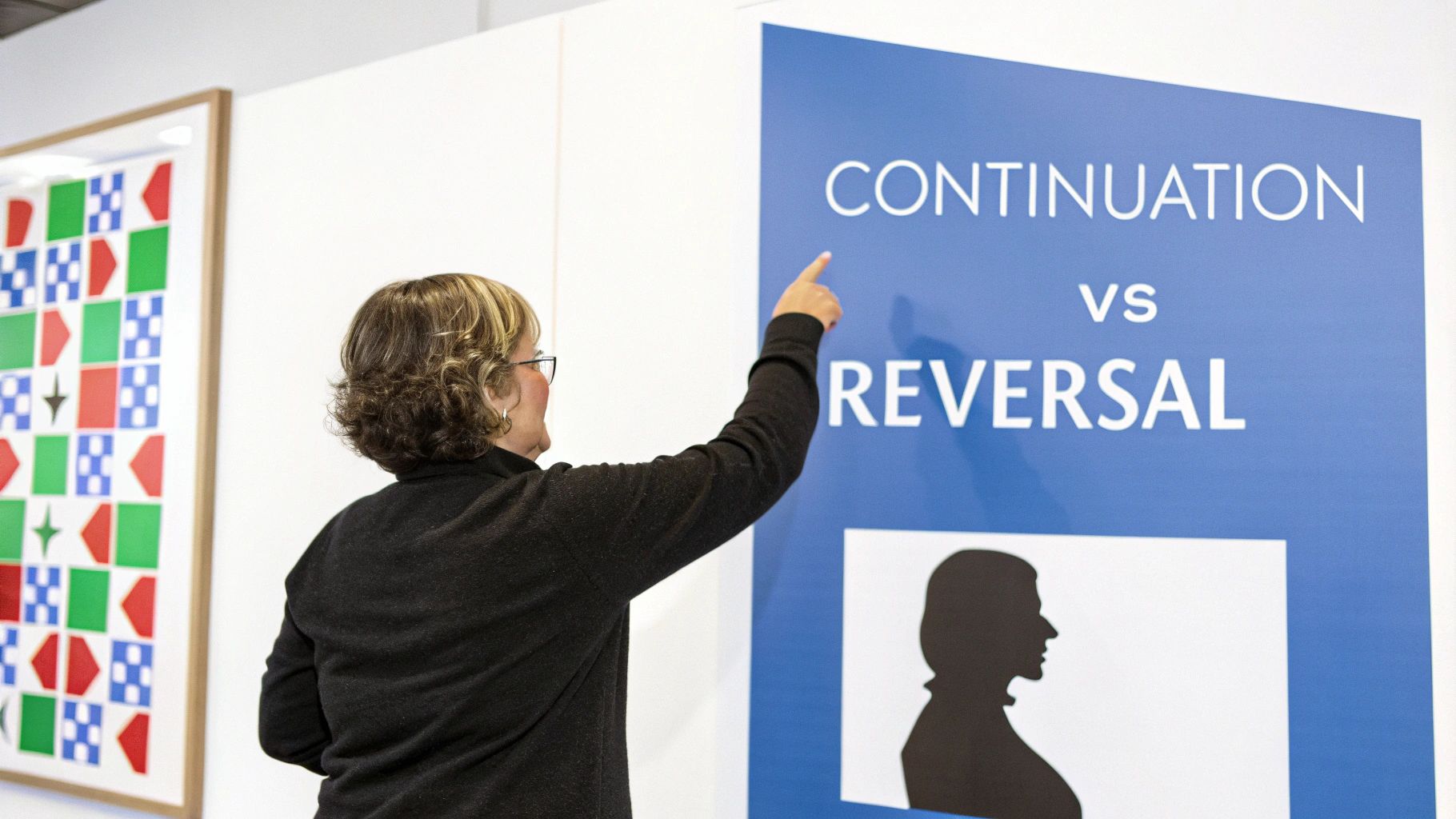 Woman points at a blue sign illustrating 'CONTINUATION vs REVERSAL' next to a colorful patterned artwork.