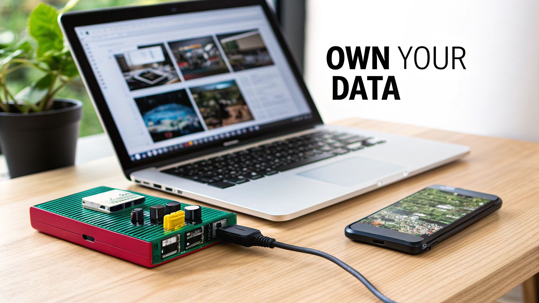 A desk setup with a laptop, Raspberry Pi, and smartphone, emphasizing personal data ownership.