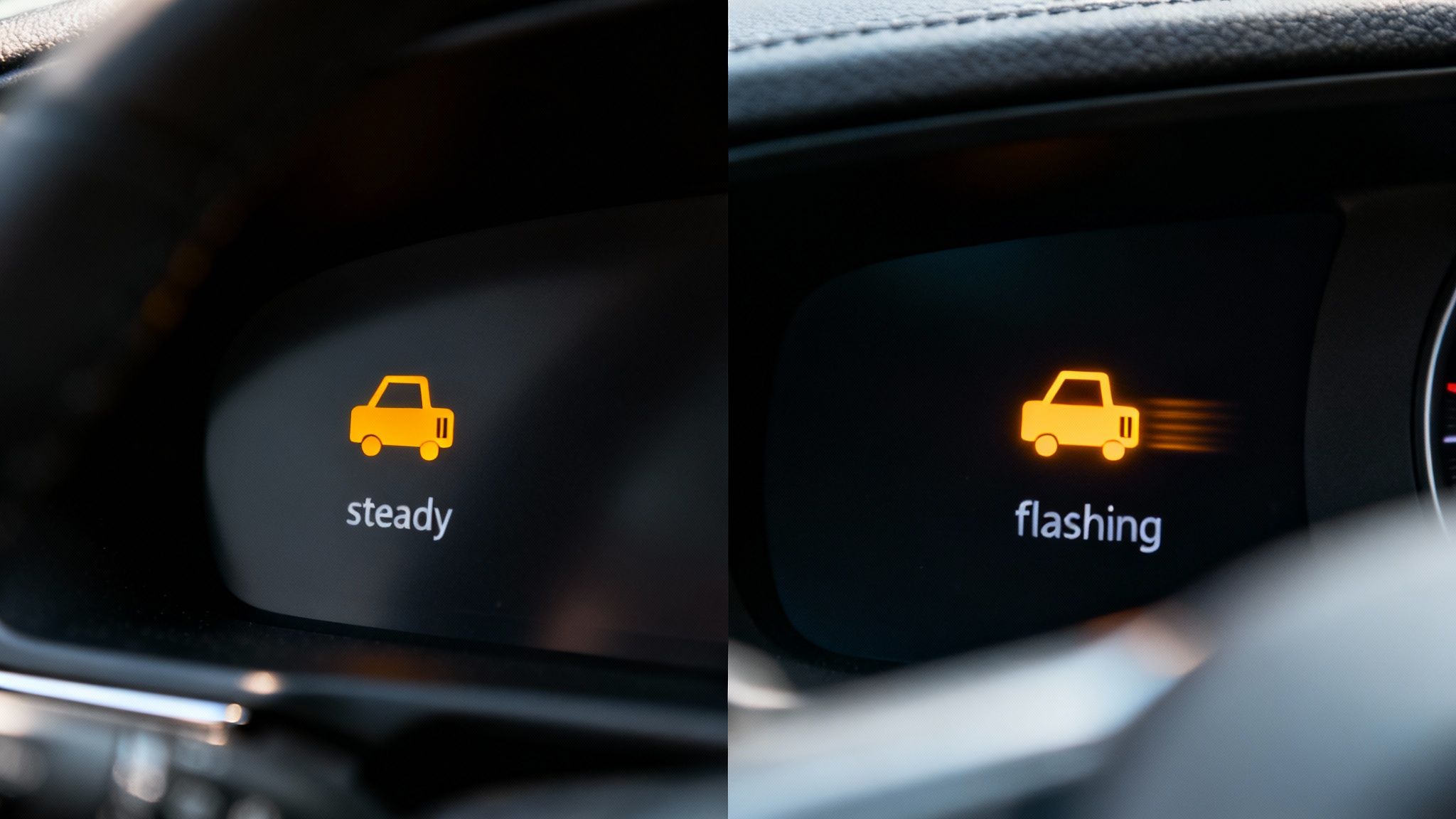 Close-up of a car dashboard showing two illuminated orange icons, one steady and one flashing, depicting a car.