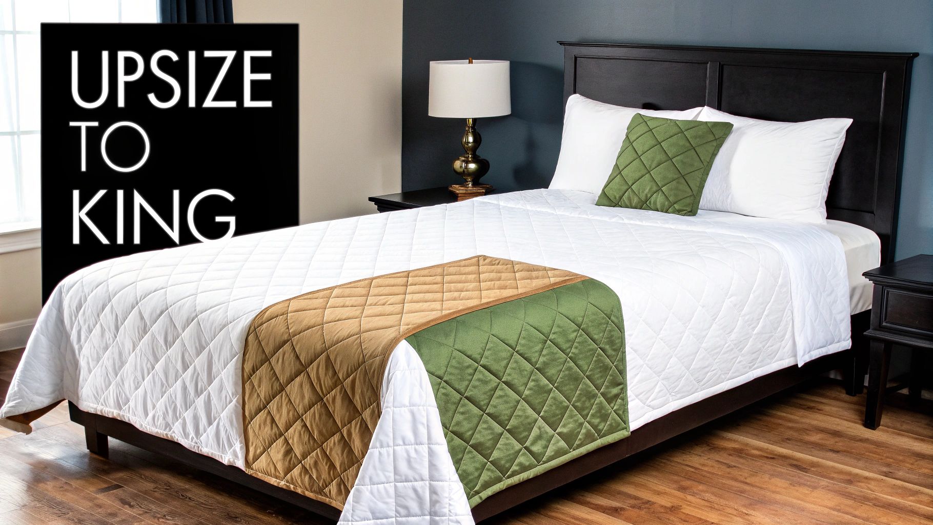 A well-made bed with white bedding, a green pillow, and a brown and green quilted bed runner, next to a black headboard.