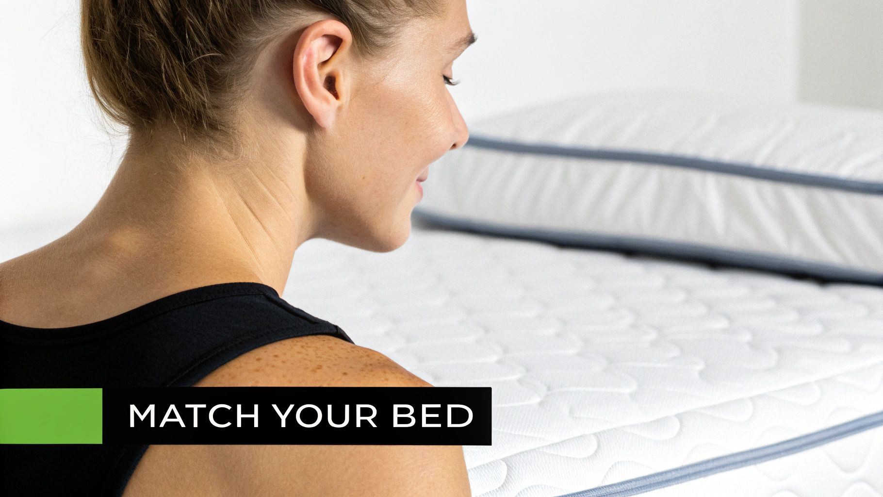 A person sleeping on their side in bed, demonstrating the relationship between body, pillow, and mattress.