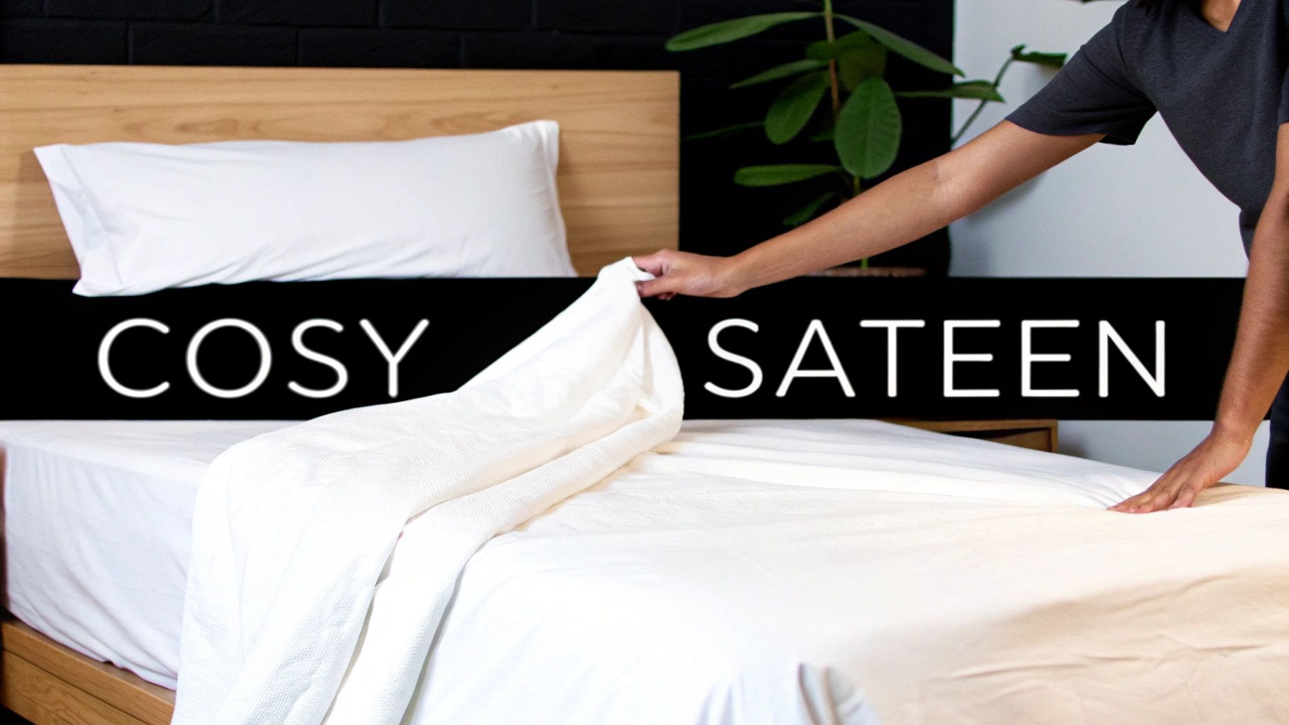 A neatly made bed with cosy-looking cotton sateen sheets