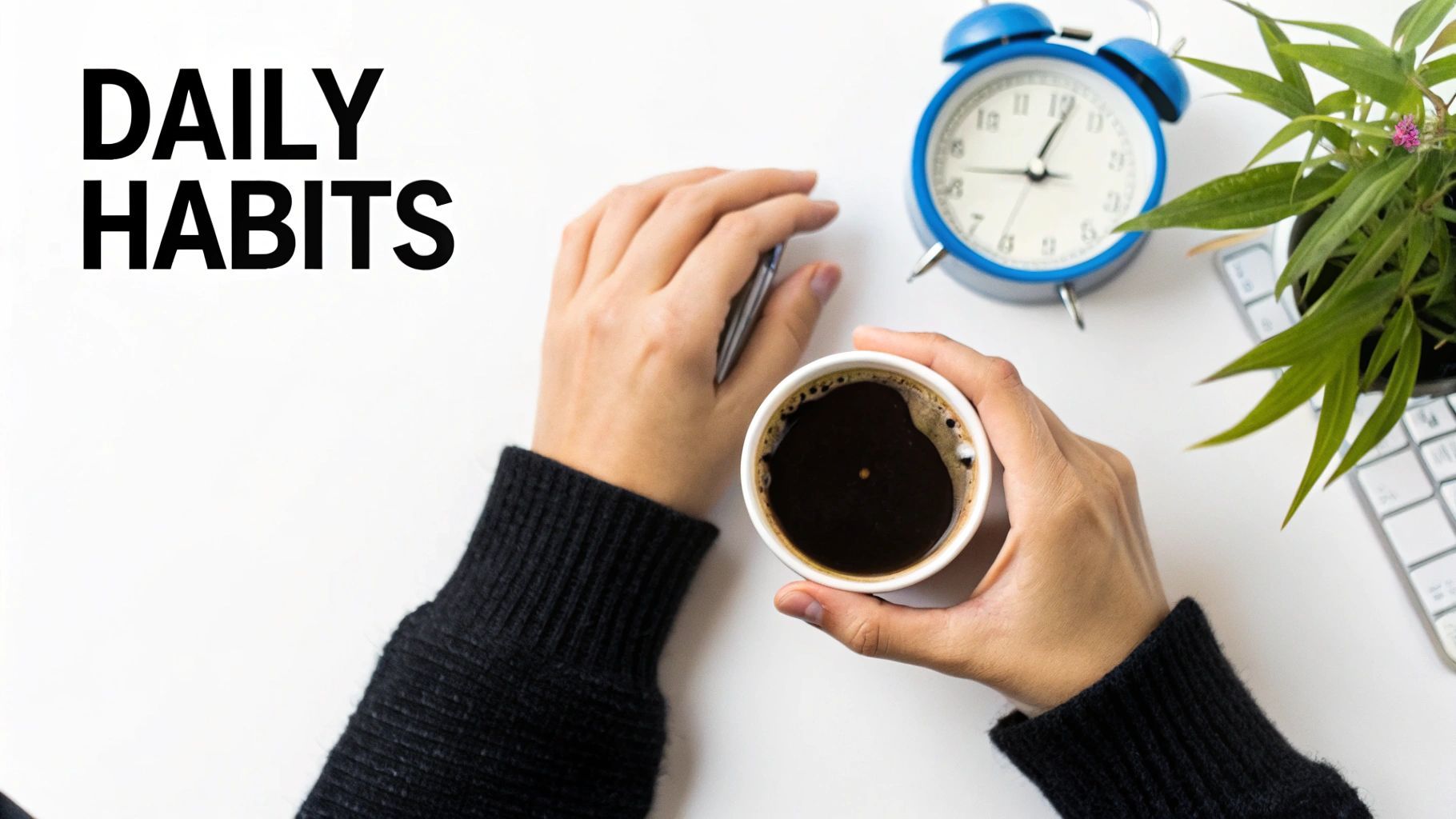 Woman tending to a small desk plant in a serene, decluttered workspace.