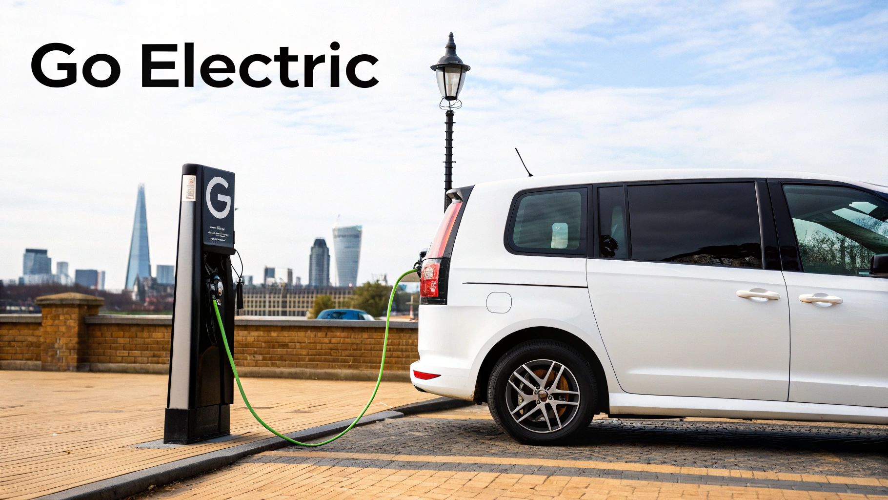 An eco-friendly electric minivan used for London minivan hire by West London Minibus Hire, parked in a green area.