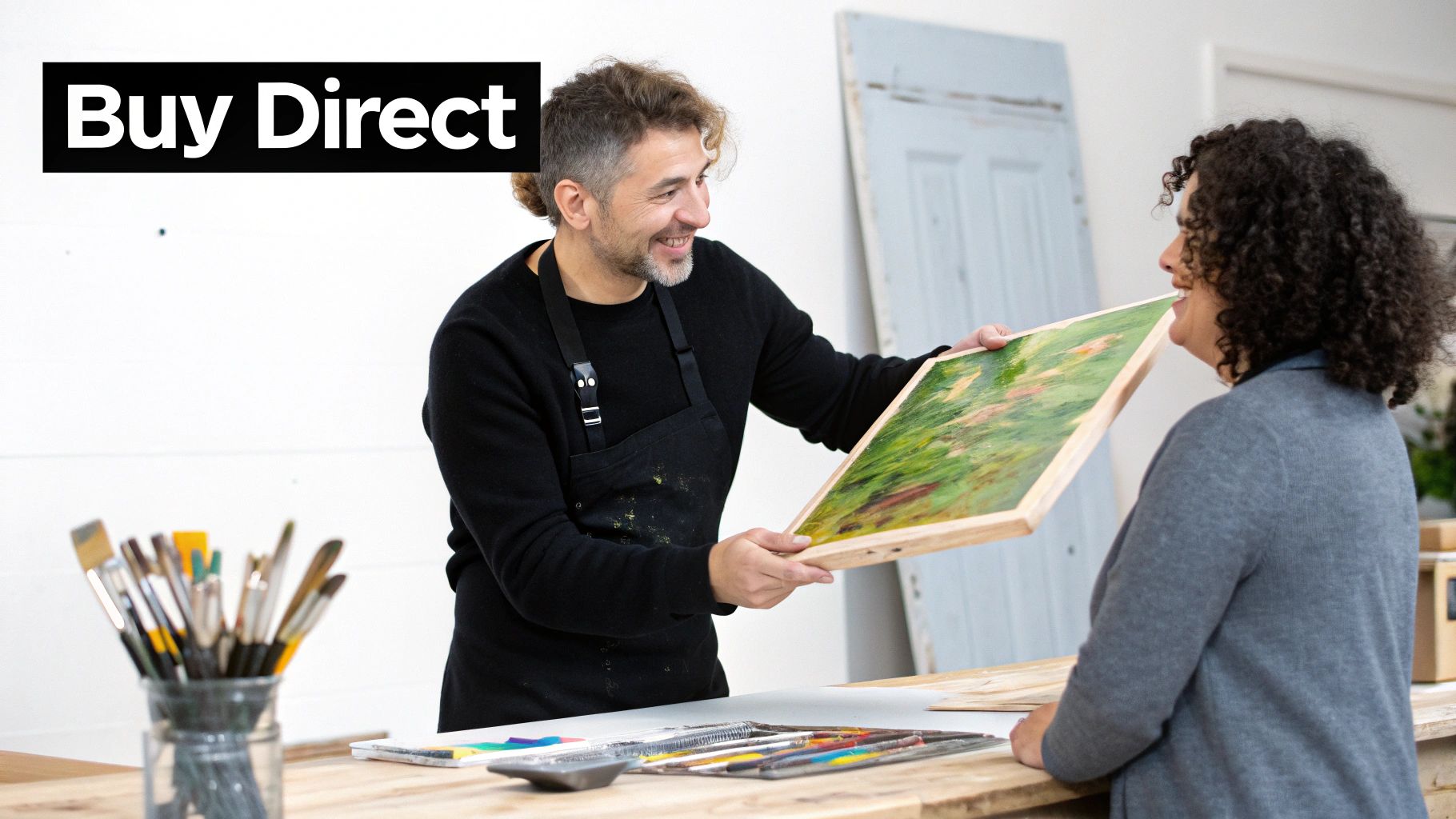 An artist in their sunlit studio, surrounded by finished canvases and works in progress.