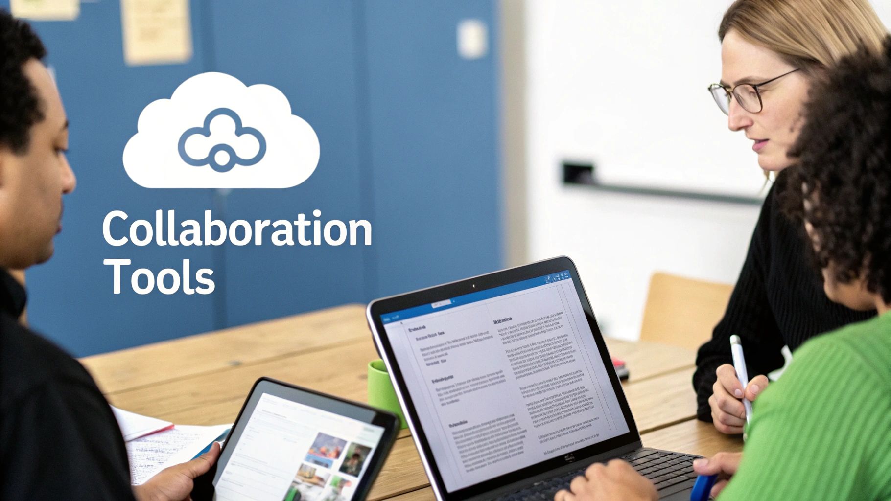 Three diverse colleagues actively collaborating around a table with a laptop and a tablet, showcasing cloud-based collaboration tools.