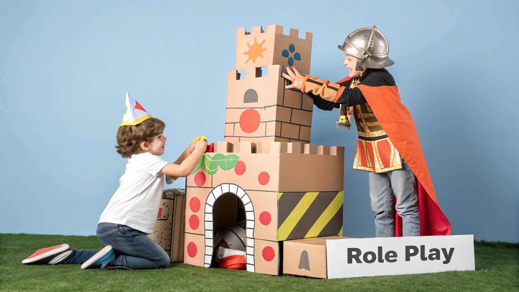 A child playing with a large cardboard box, pretending it's a rocket ship, demonstrating what is imaginative play.