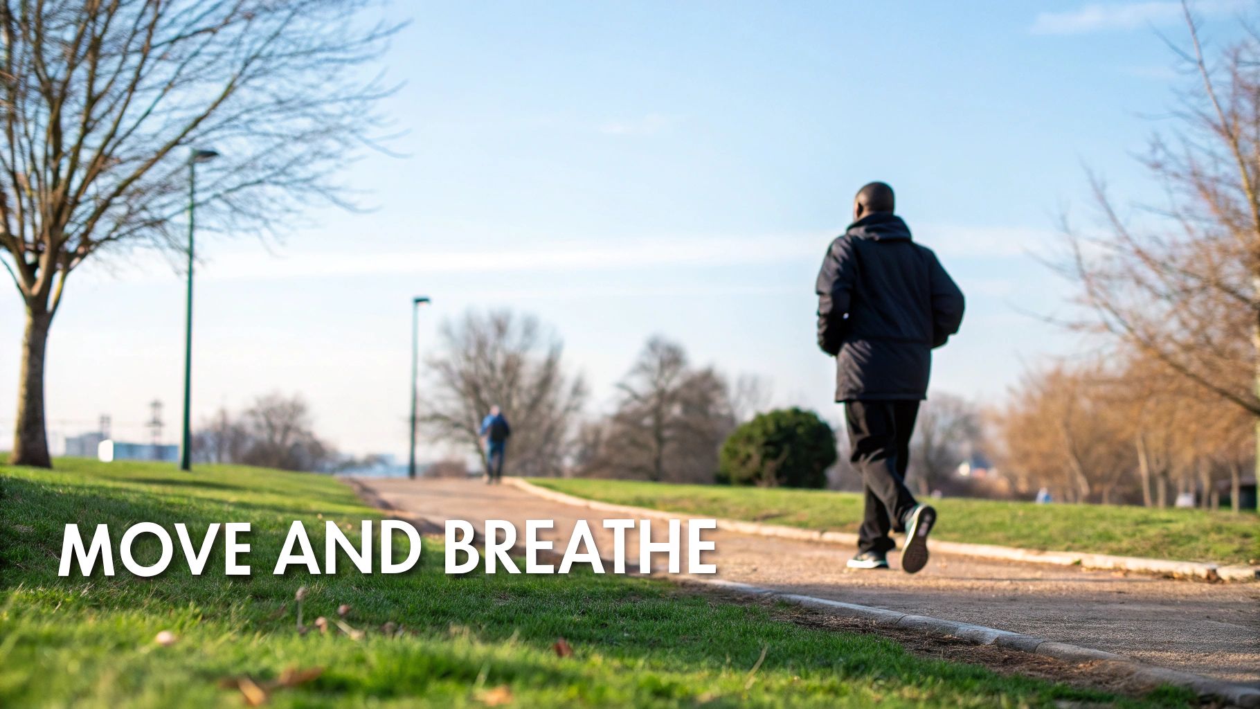 Rear view of a person jogging on a path in a sunny park with trees and grass, text 'MOVE AND BREATHE'.