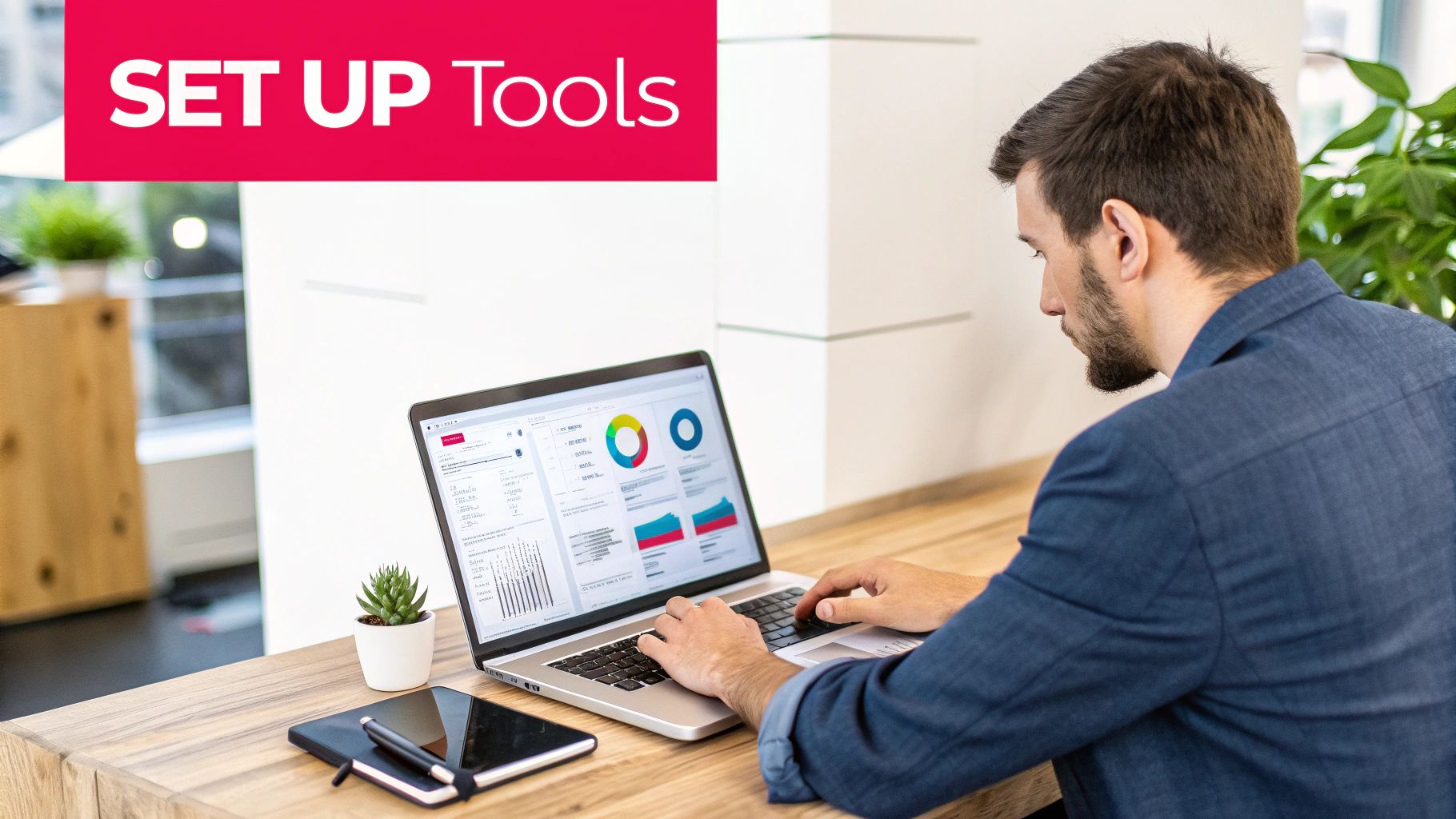 A person working on a laptop with charts and graphs, implementing an attribution strategy.