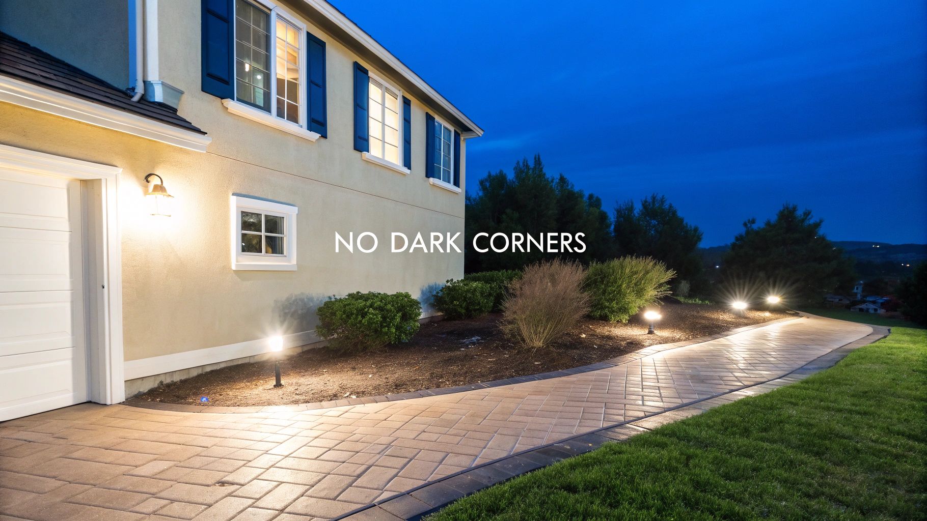 Well-lit home exterior with landscape lighting and motion-activated lights