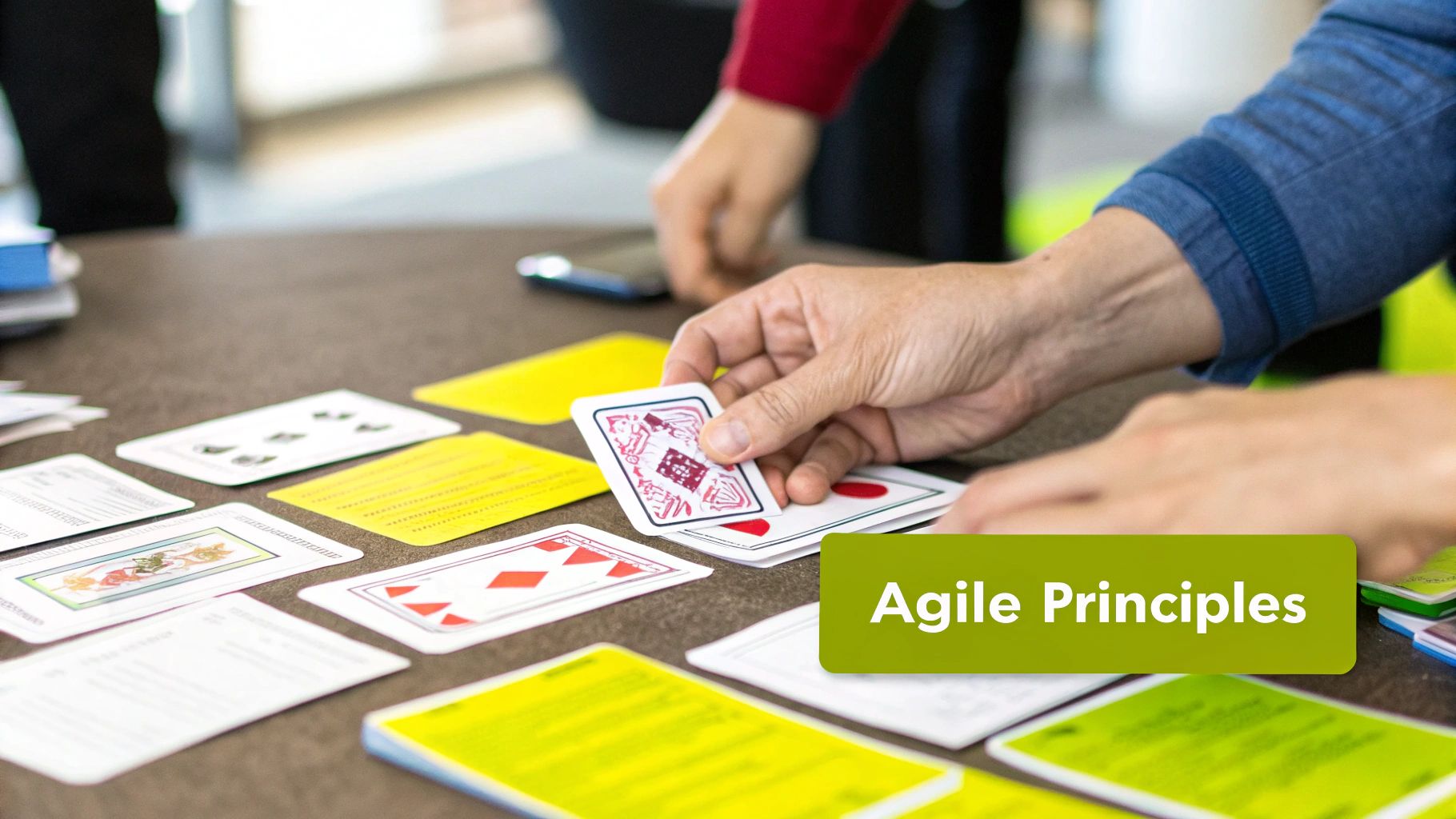 An illustrated graphic showing the four core values of the Agile Manifesto.