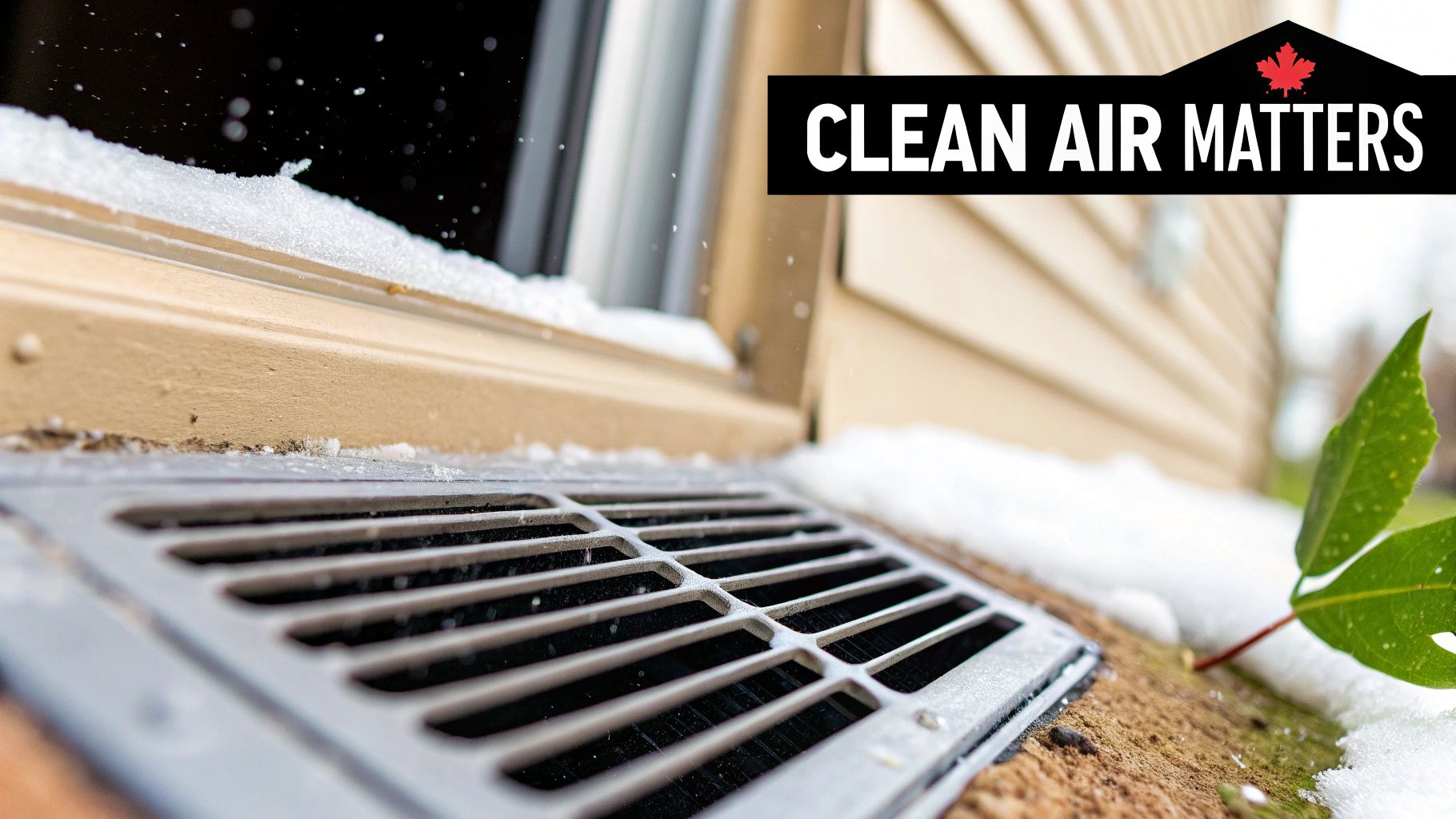 Air Duct Cleaning How To: A Canadian Homeowner's Guide 1 A close-up of an outdoor vent partially covered in snow near a building foundation, emphasizing clean air.