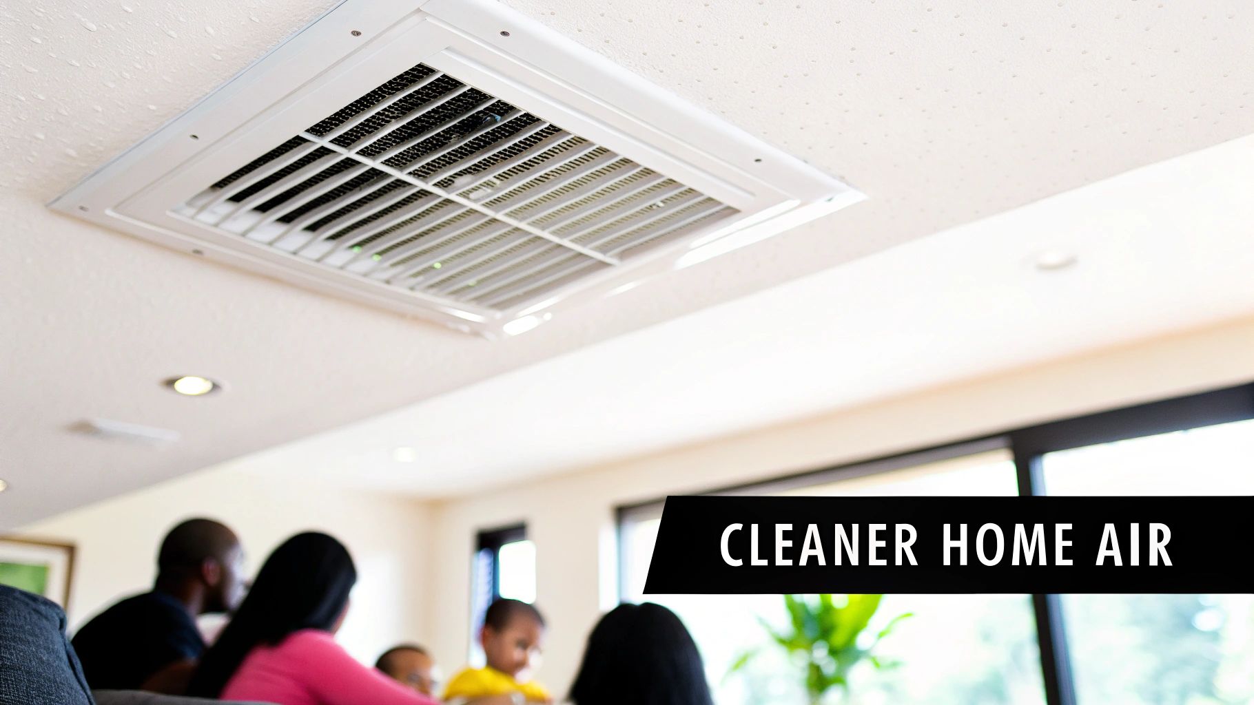 A ceiling-mounted HVAC air conditioning vent in a home with a blurred family below.