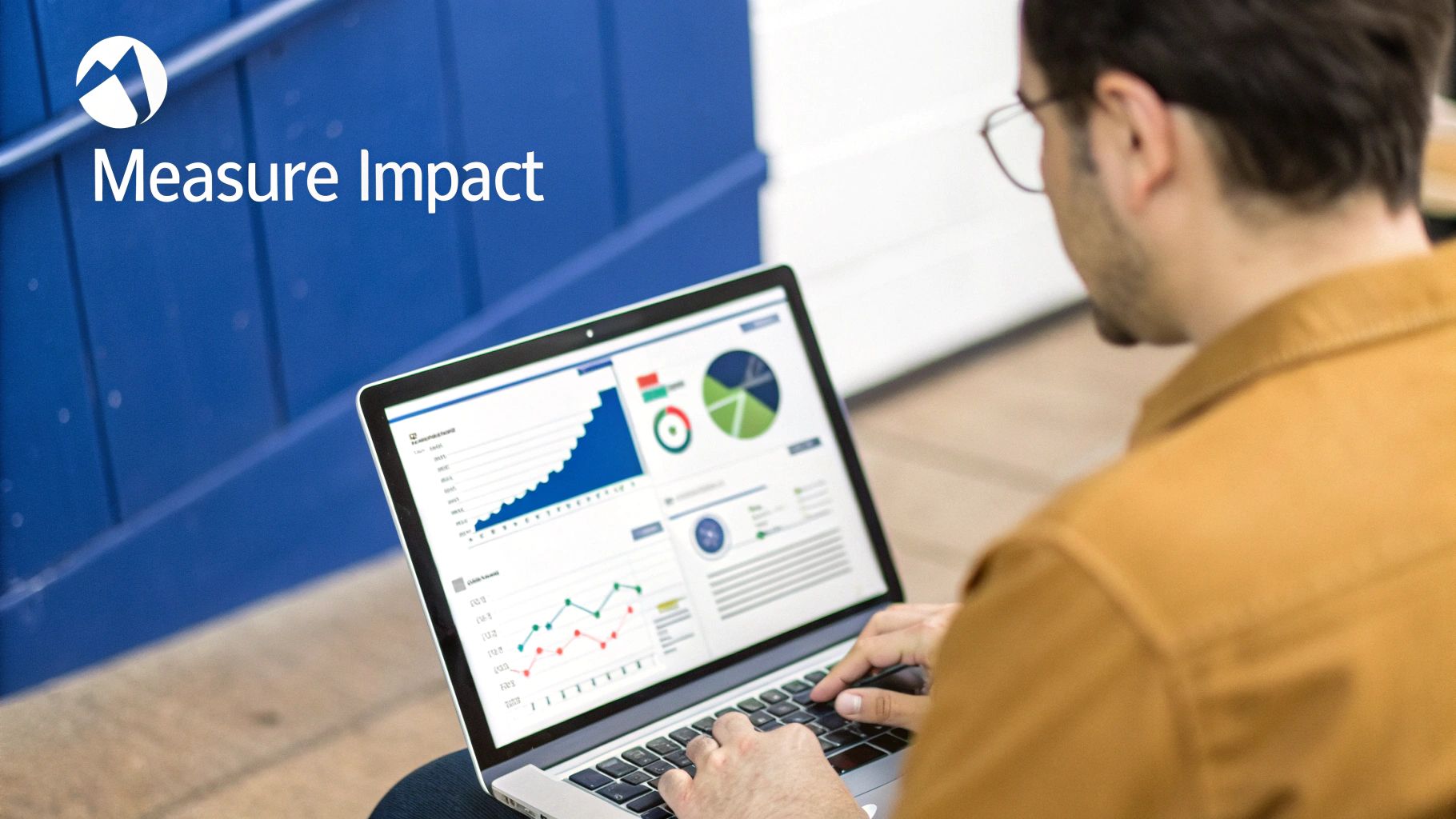 Man using a laptop outdoors, displaying data charts and graphs on screen, with 'Measure Impact' text.