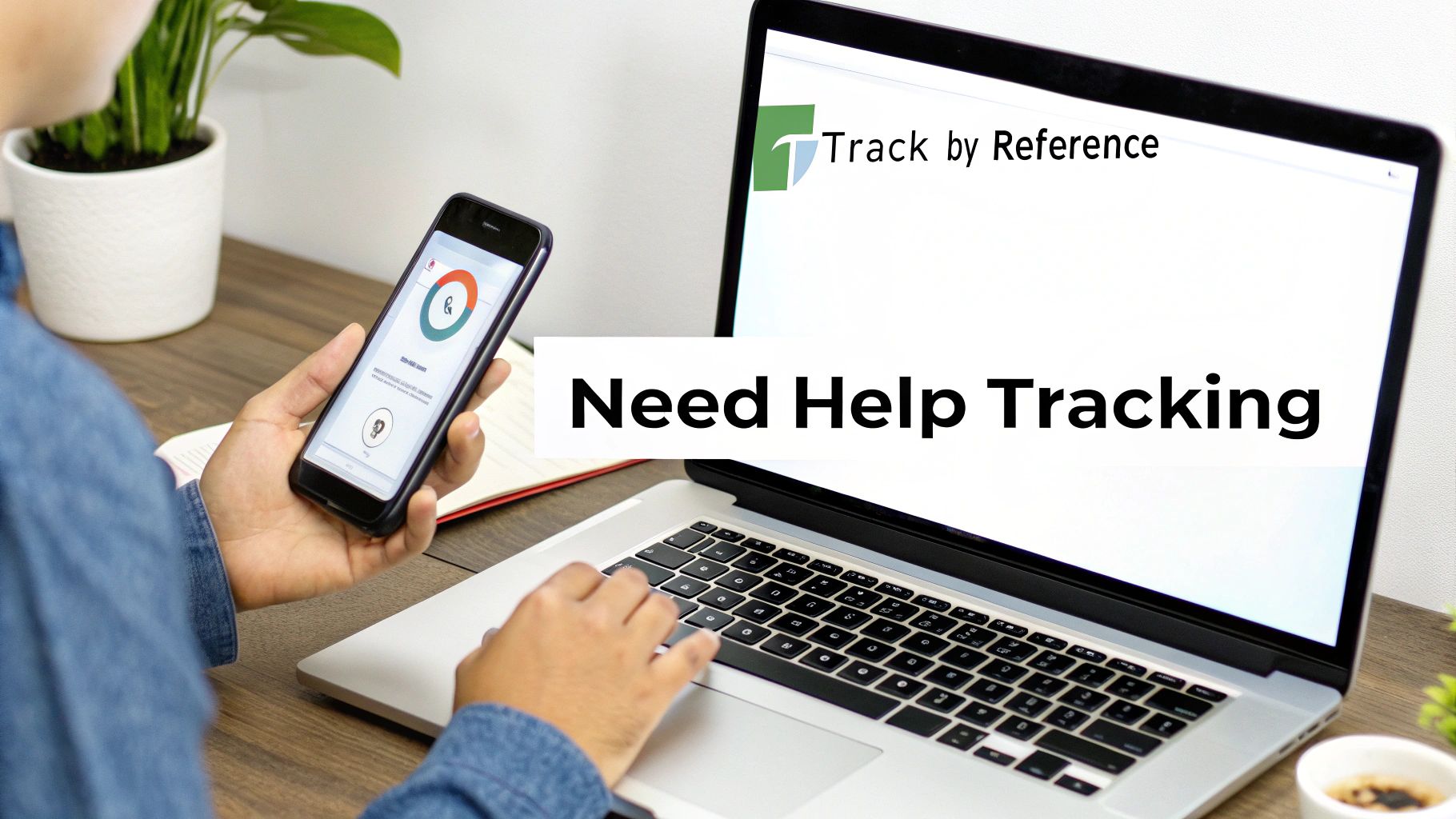 A person is using a laptop displaying 'Track by Reference' and a smartphone with a tracking app.