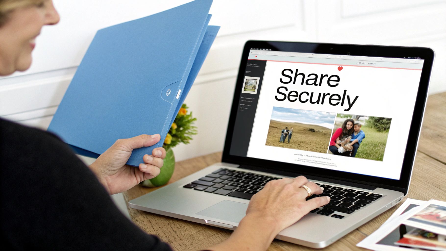A person smiles while holding a blue folder and typing on a laptop showing "Share Securely" with family photos.