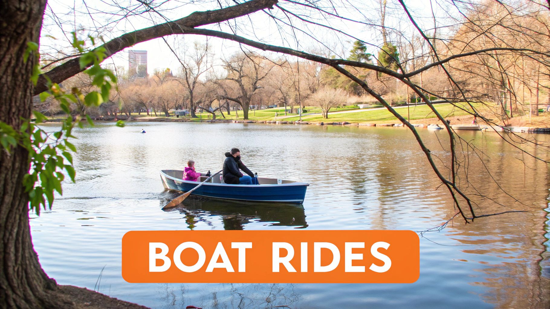 A man and a child on a blue rowboat enjoying a peaceful ride on a lake.