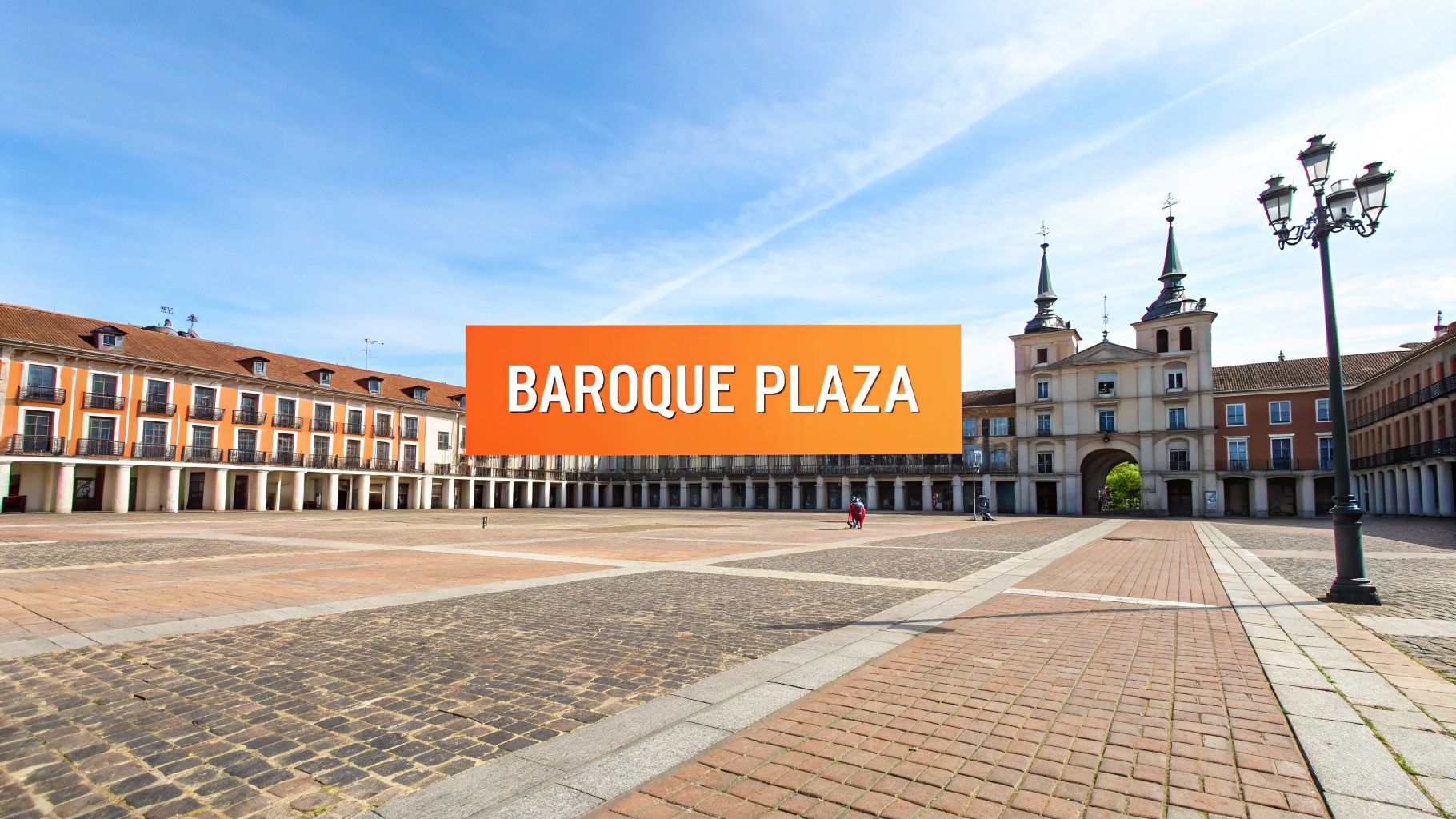 A grand baroque plaza featuring historic buildings, an archway with spires, and a wide open space under a blue sky.