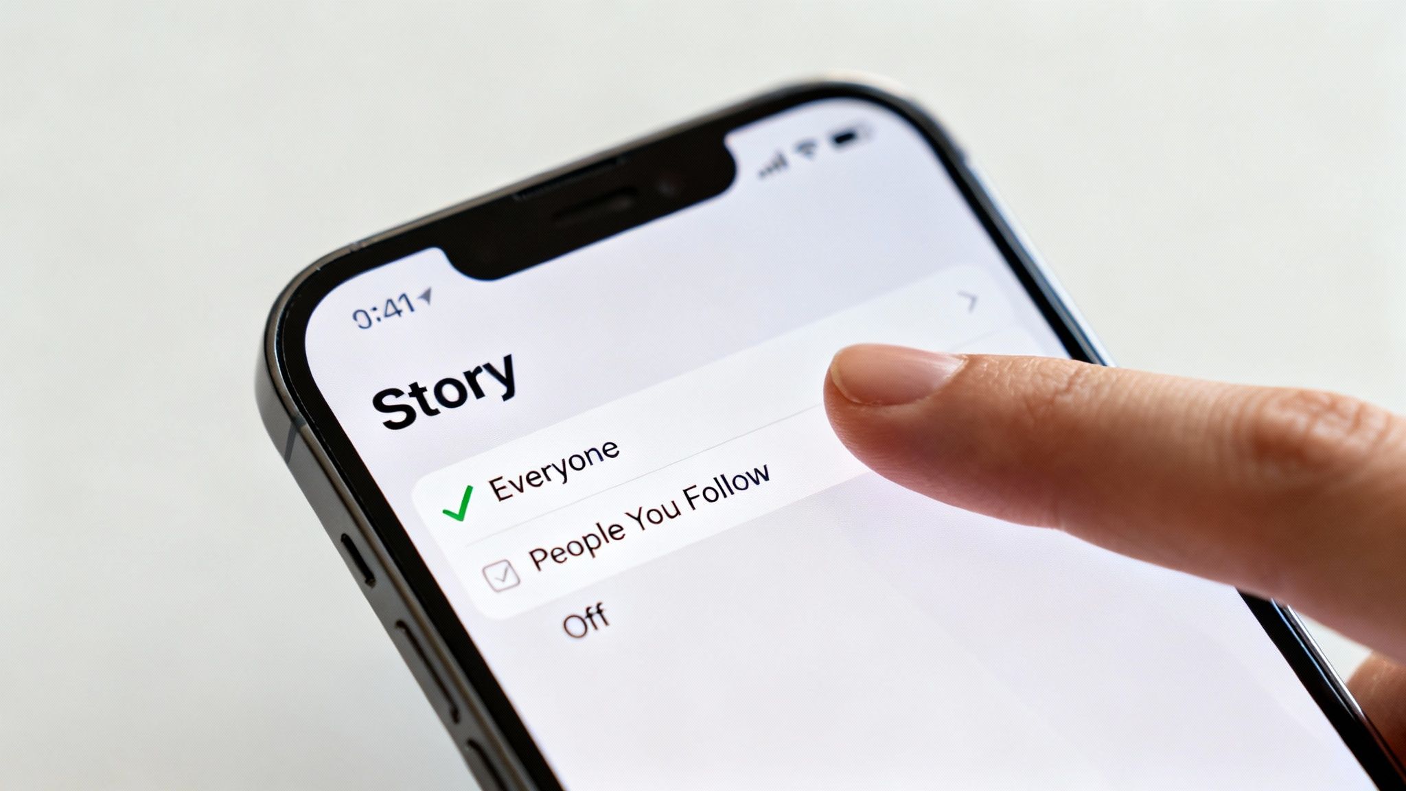 A hand touching a smartphone screen displaying Instagram Story privacy settings with 'Everyone' selected.