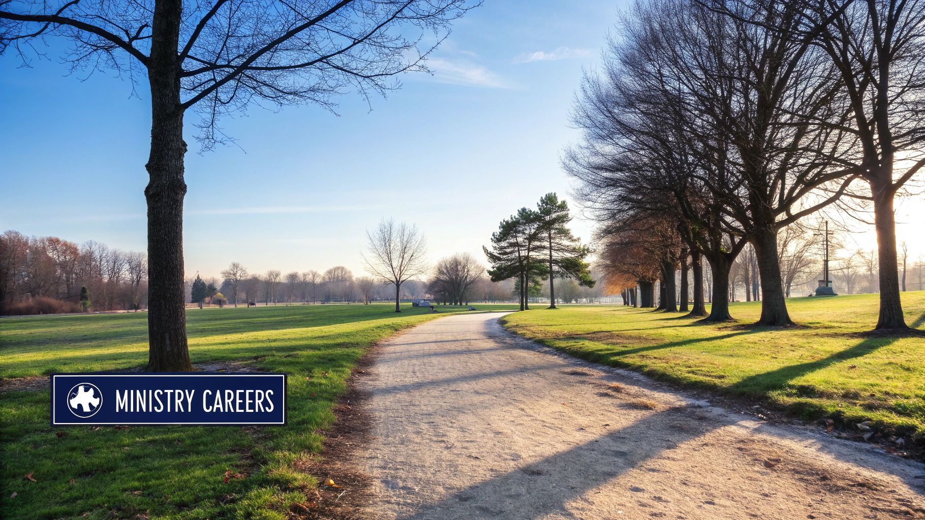 A sunny park path winding through bare trees and green grass, with a 'MINISTRY CAREERS' sign.
