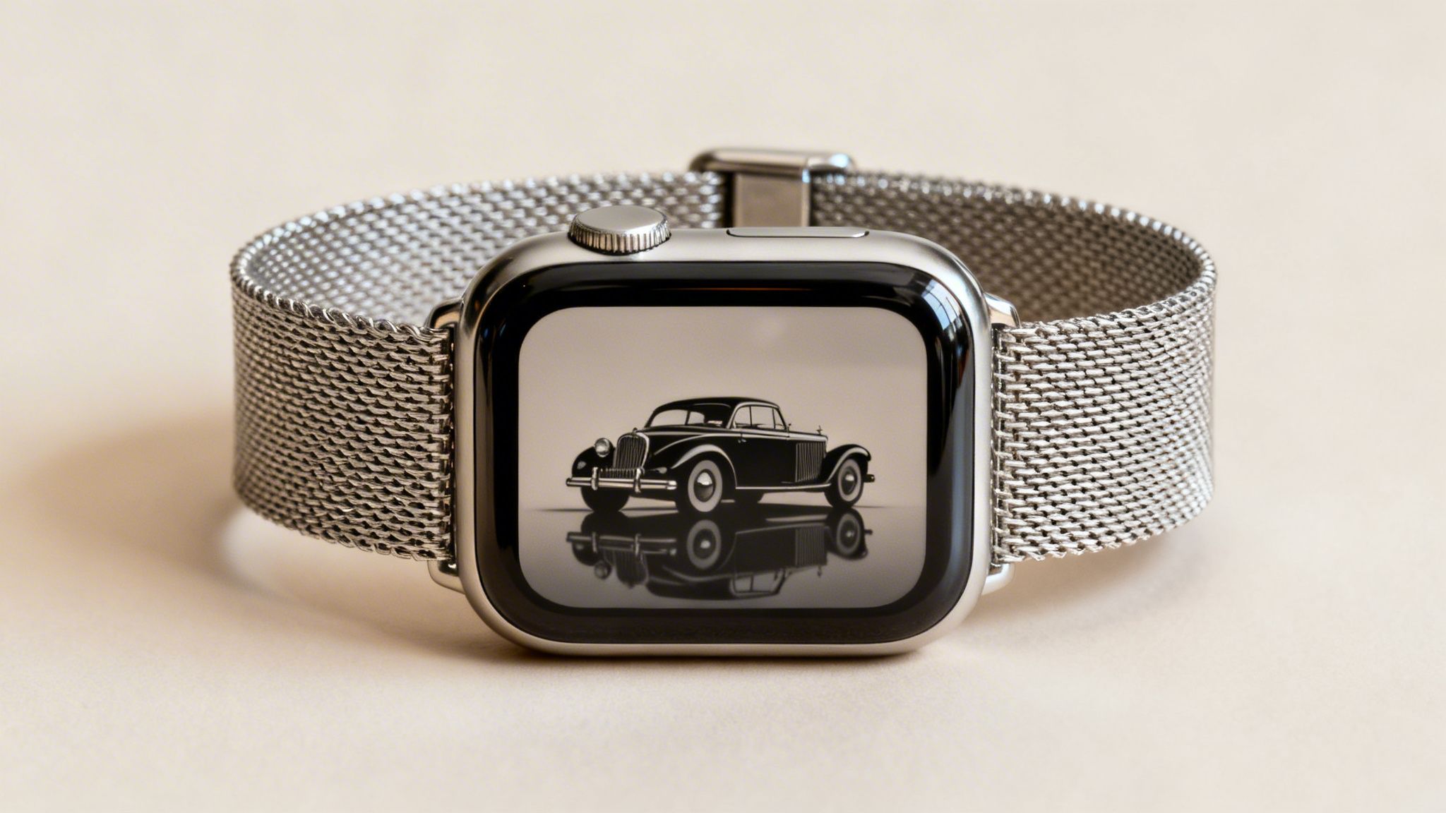 A silver Apple Watch with a Milanese loop band displays a classic black car on its screen.