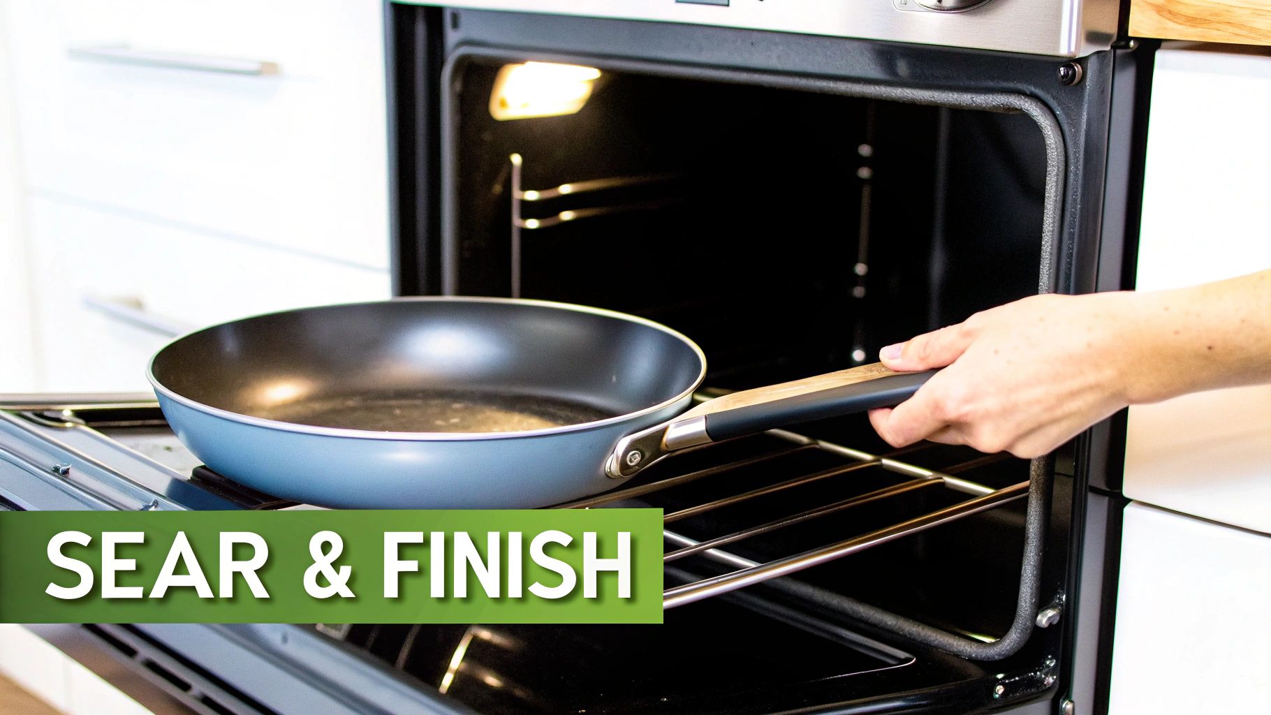 A hand places a light blue frying pan with a dark handle into an open, lit oven.