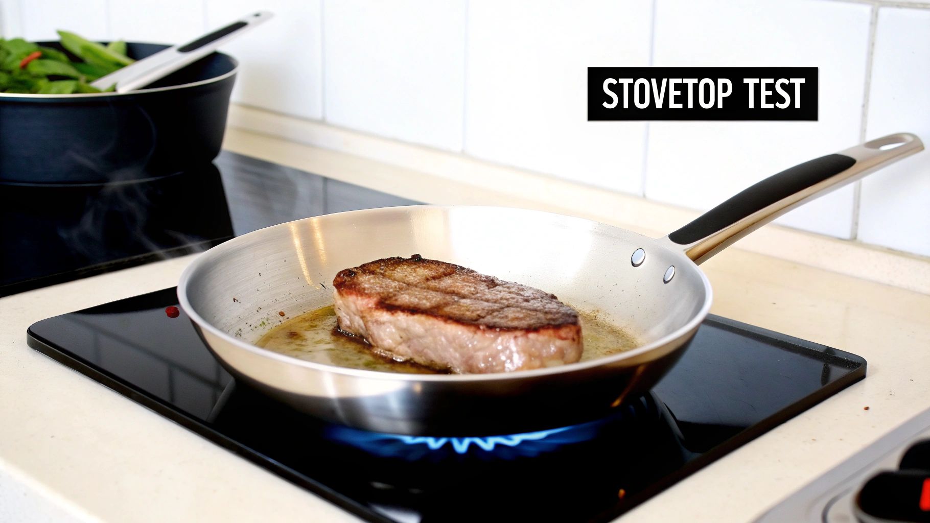 A person searing a steak in a modern titanium pan.