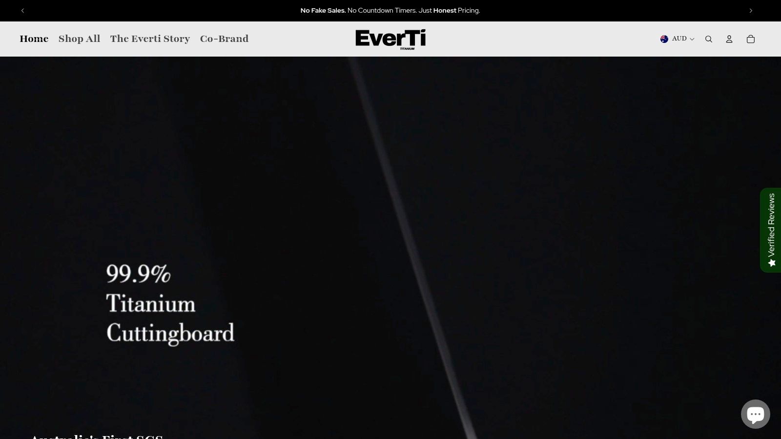 A sleek, pure titanium cutting board from Everti showcased in a modern kitchen setting, highlighting its minimalist design and hygienic surface.