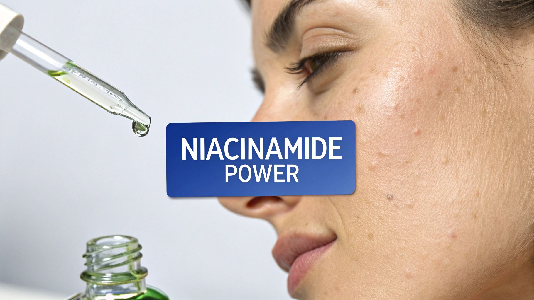 Close-up of a dropper dispensing niacinamide serum into a bottle, with a person's face in the background.