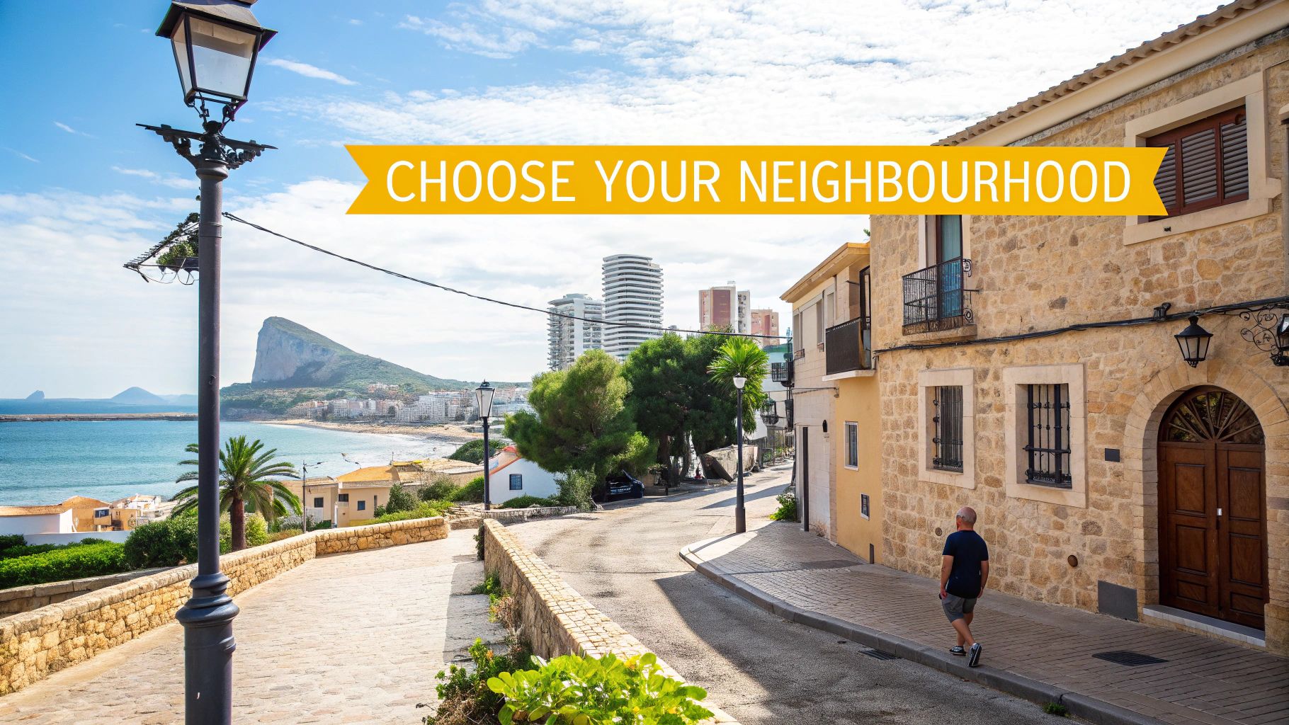 A charming coastal street with traditional stone buildings overlooking the sea and a mountain, with a promotional banner.