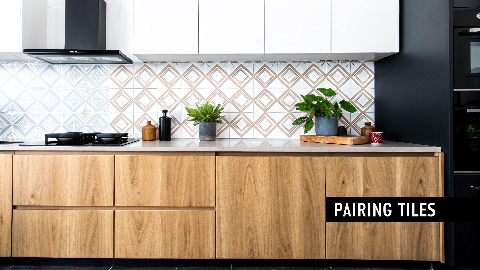 Modern kitchen features light wood cabinets, grey countertop, and unique split patterned ceramic tile backsplash.