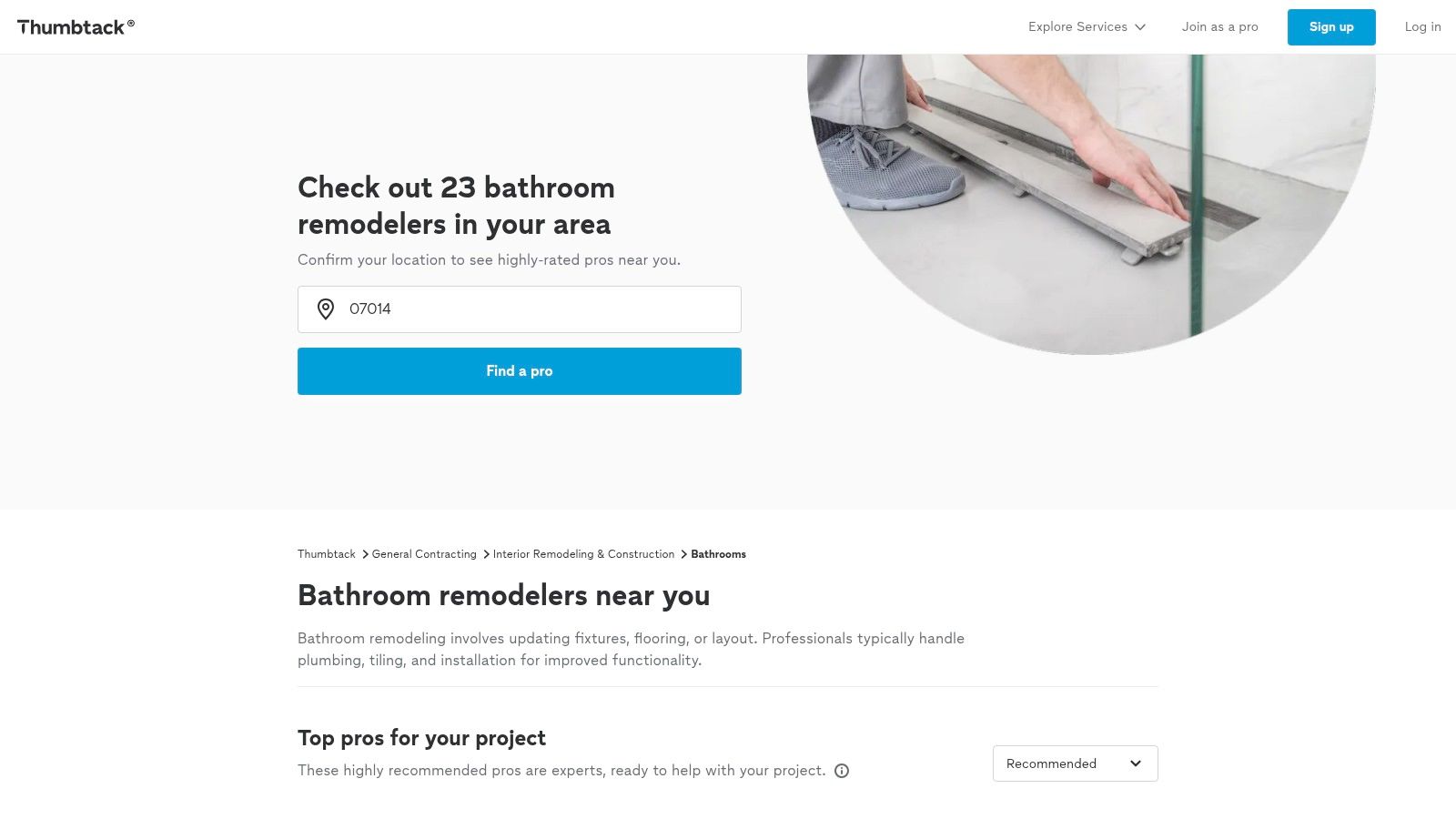 A modern bathroom with sleek fixtures and a glass-enclosed shower, representing the quality of work found on Thumbtack.