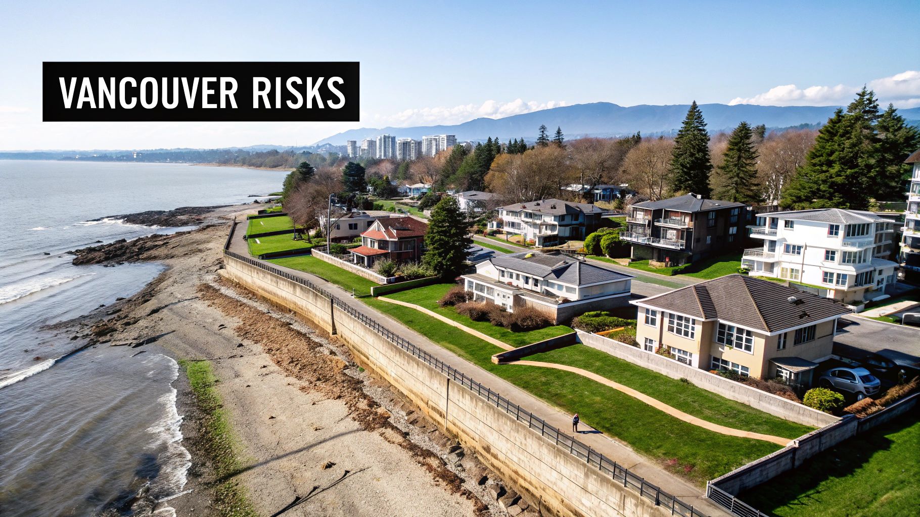 Aerial view of Vancouver waterfront homes with seawall and mountains showing coastal property risks