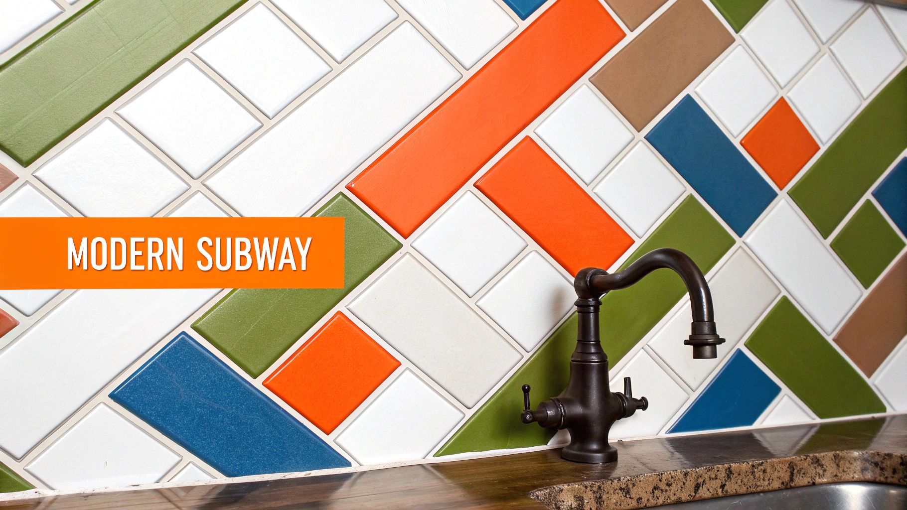 Modern kitchen backsplash featuring a vibrant diagonal pattern of white, orange, green, blue, and brown subway tiles above a granite countertop and a dark bronze faucet.