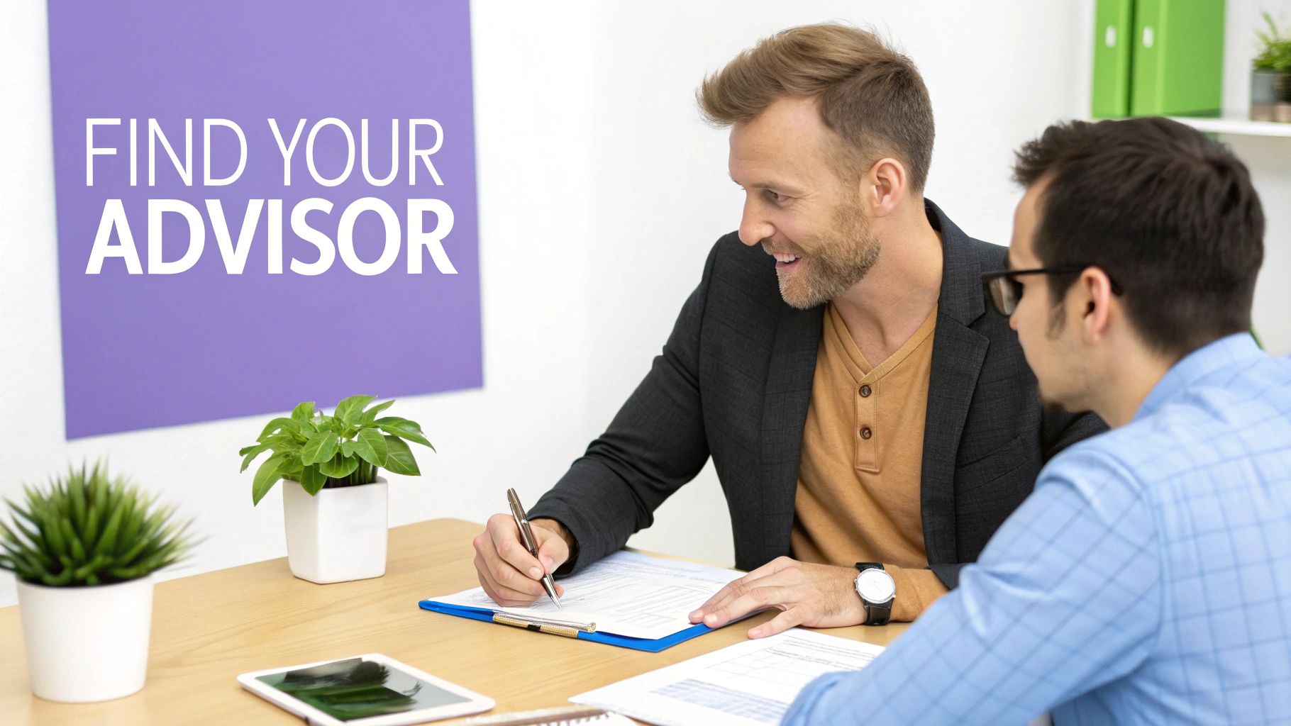 Two men, one smiling, discussing documents at a desk, with a 'FIND YOUR ADVISOR' sign.