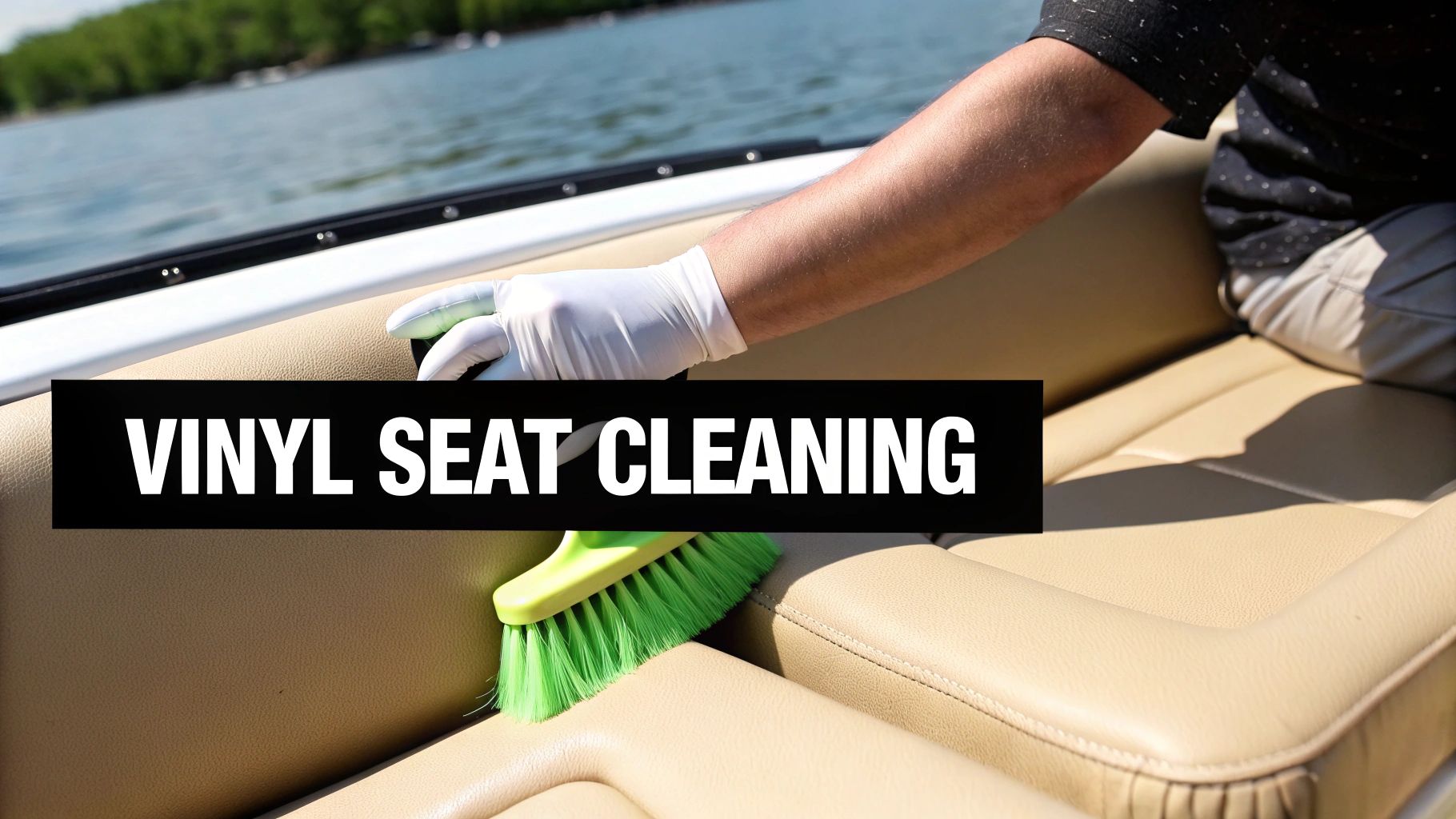 A person in white gloves cleans a beige vinyl boat seat with a green brush, illustrating boat seat cleaning.