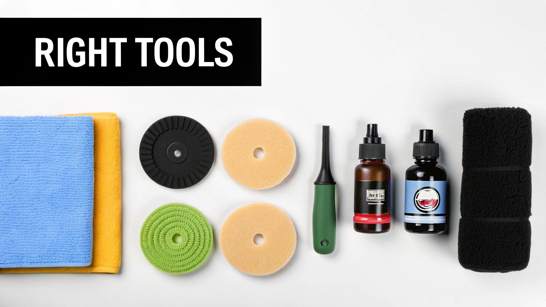 A flat lay of various detailing tools, including microfiber towels, polishing pads, brushes, and liquid bottles.