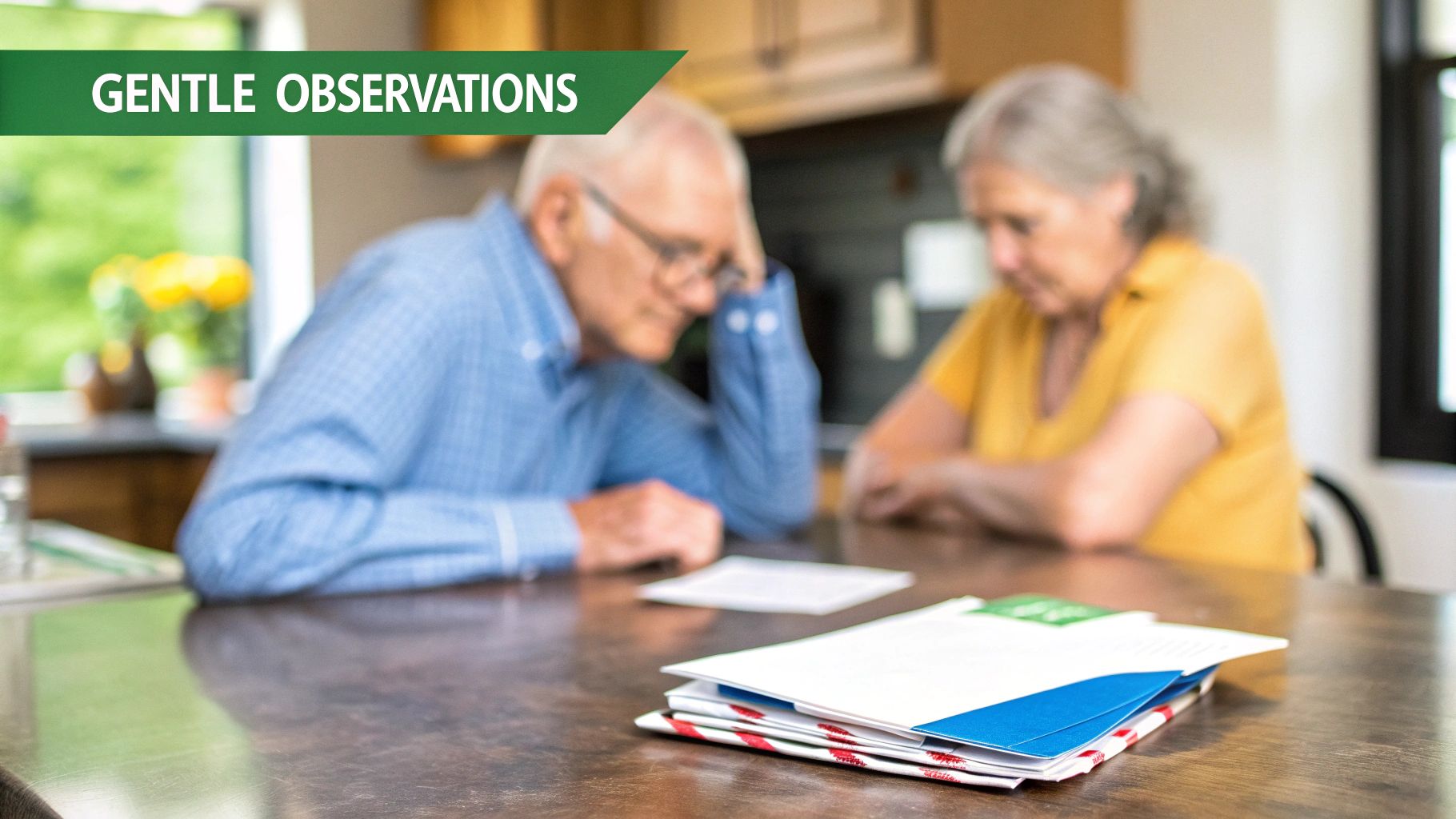 Elderly couple looks worried while sitting at a kitchen table with a stack of mail.