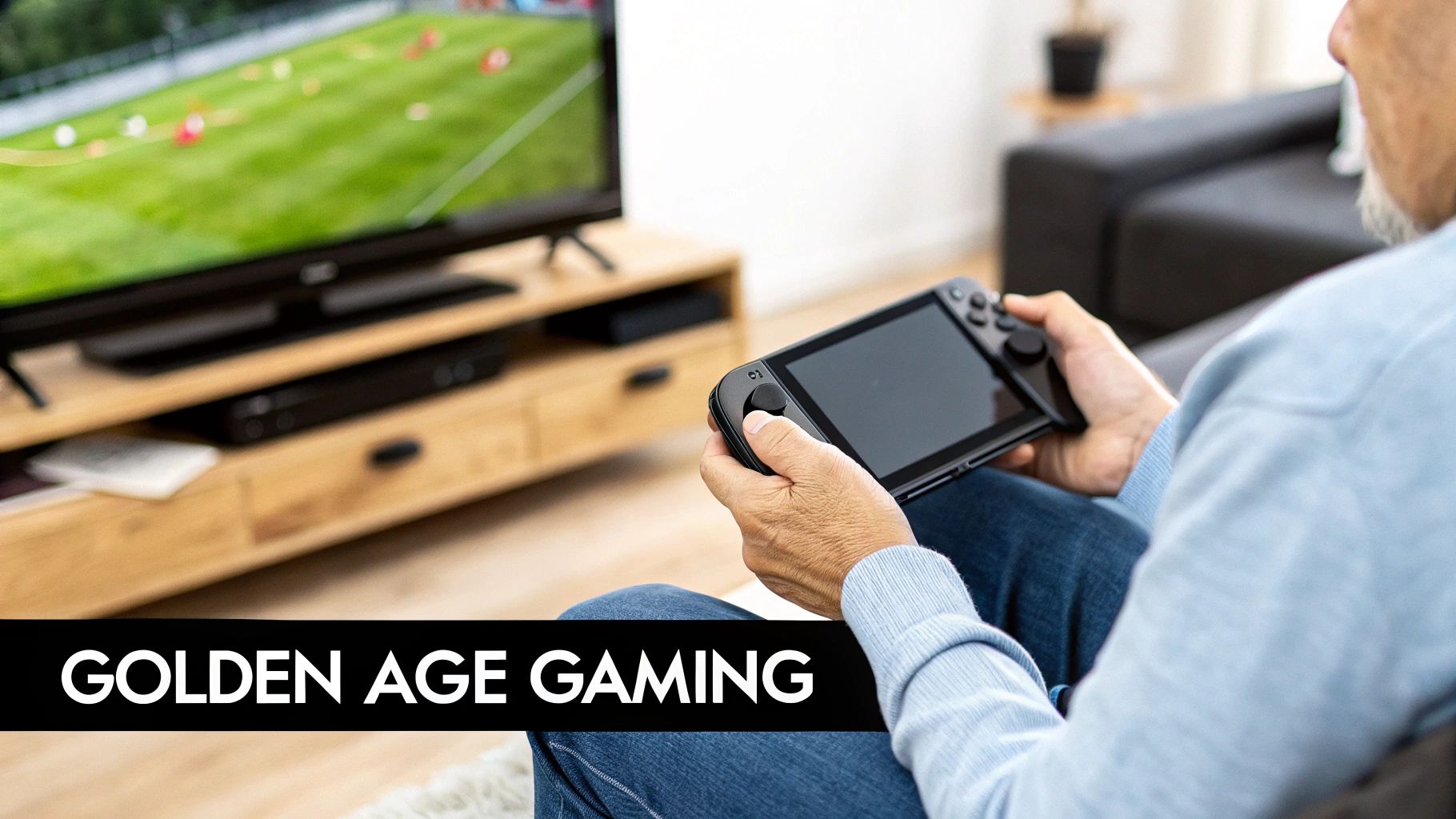 A person holding a handheld gaming console while sitting on a couch.
